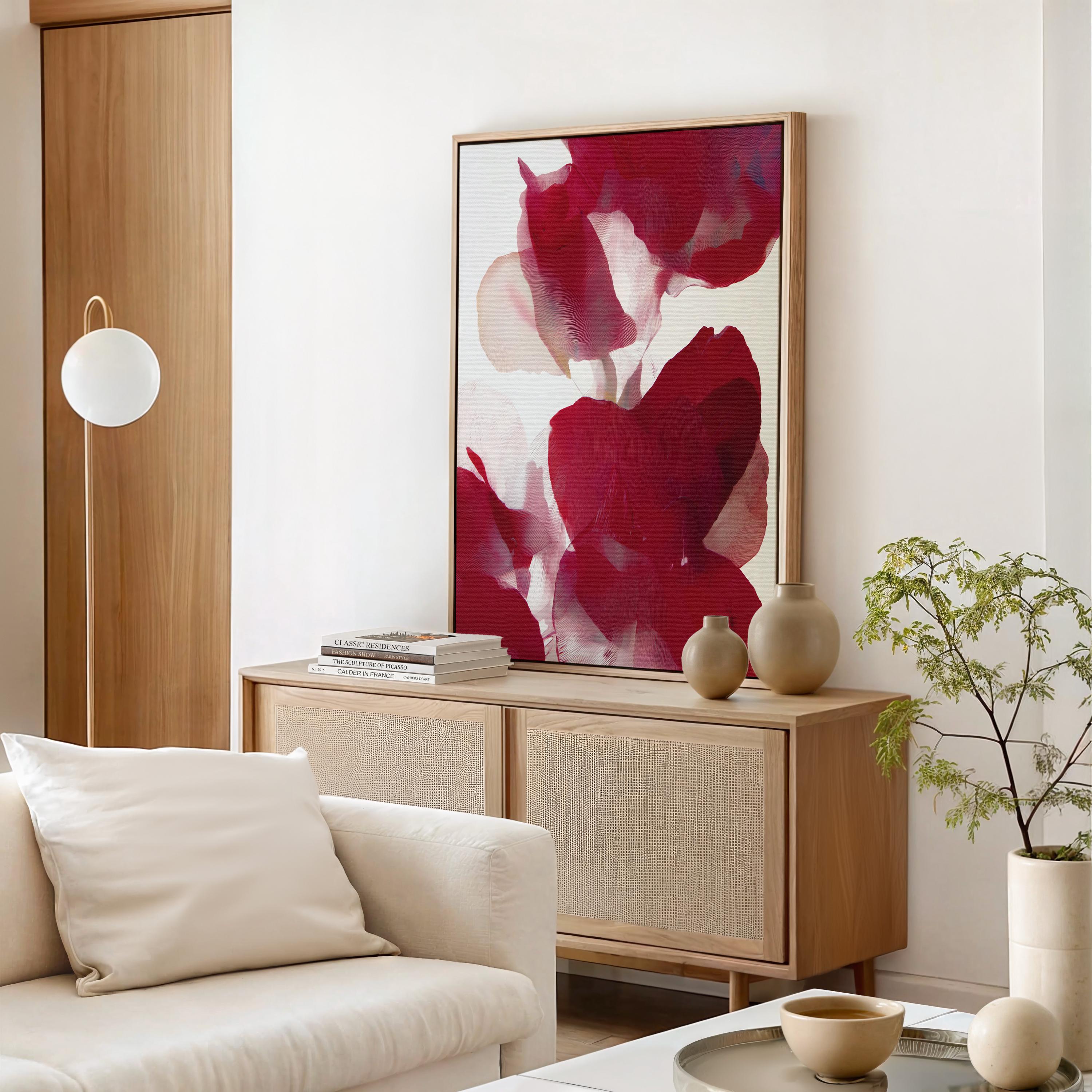 Vertical abstract red and blush floral canvas with rich poinsettia-inspired tones and soft blended petals. Modern holiday wall art in a warm minimalist, color-pop seasonal style—ideal for Christmas living rooms, dining rooms, or festive entryways. Premium gallery-wrapped canvas by Muse Studio.