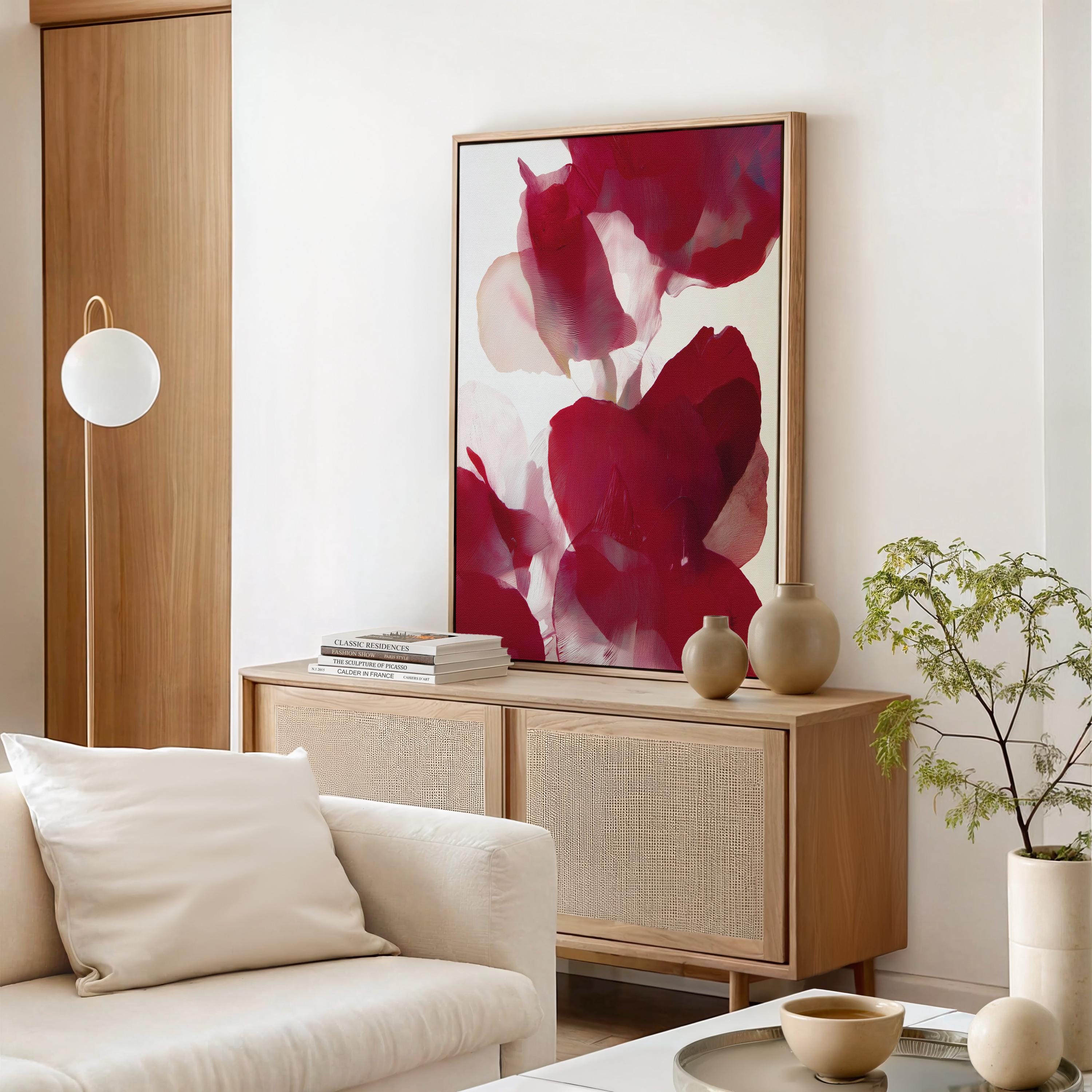 Vertical abstract red and blush floral canvas with rich poinsettia-inspired tones and soft blended petals. Modern holiday wall art in a warm minimalist, color-pop seasonal style—ideal for Christmas living rooms, dining rooms, or festive entryways. Premium gallery-wrapped canvas by Muse Studio.