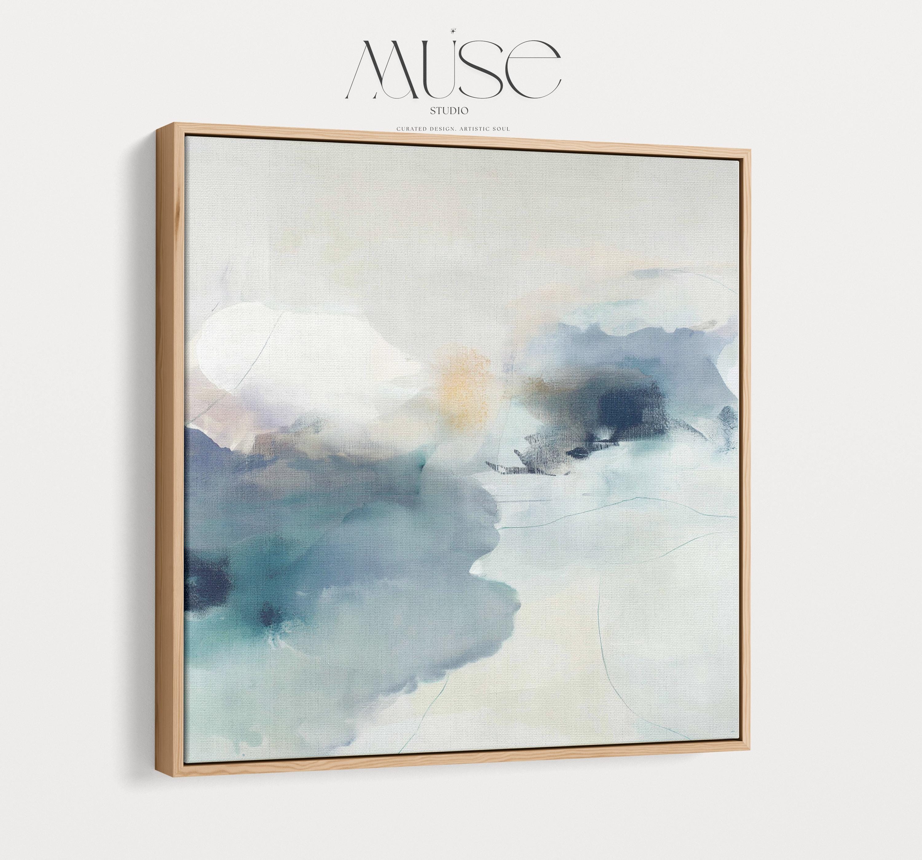 Square abstract canvas in winter white, misty blue, and soft gray tones with a serene alpine-inspired style; perfect for winter homes, lodges, and soft minimal interiors; gallery-wrapped canvas by Muse Studio.
