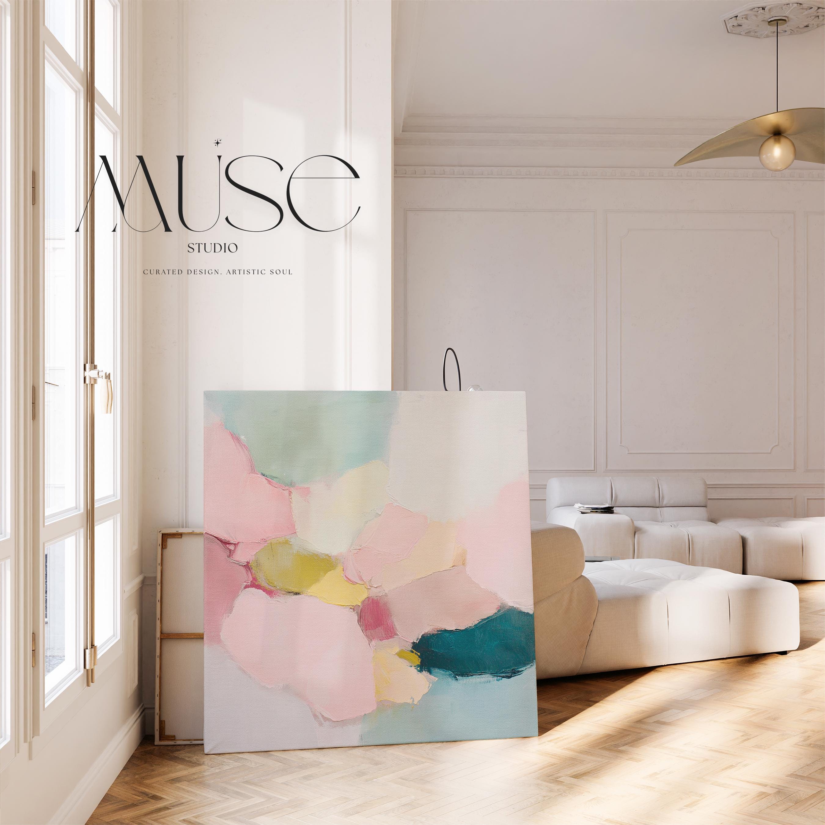 Large square abstract canvas wall art featuring blush pink, muted teal, pale aqua blue, and butter yellow painterly shapes with visible texture, styled above a modern sofa in a calm contemporary living room, offering soft color contrast and quiet luxury in oversized square format.