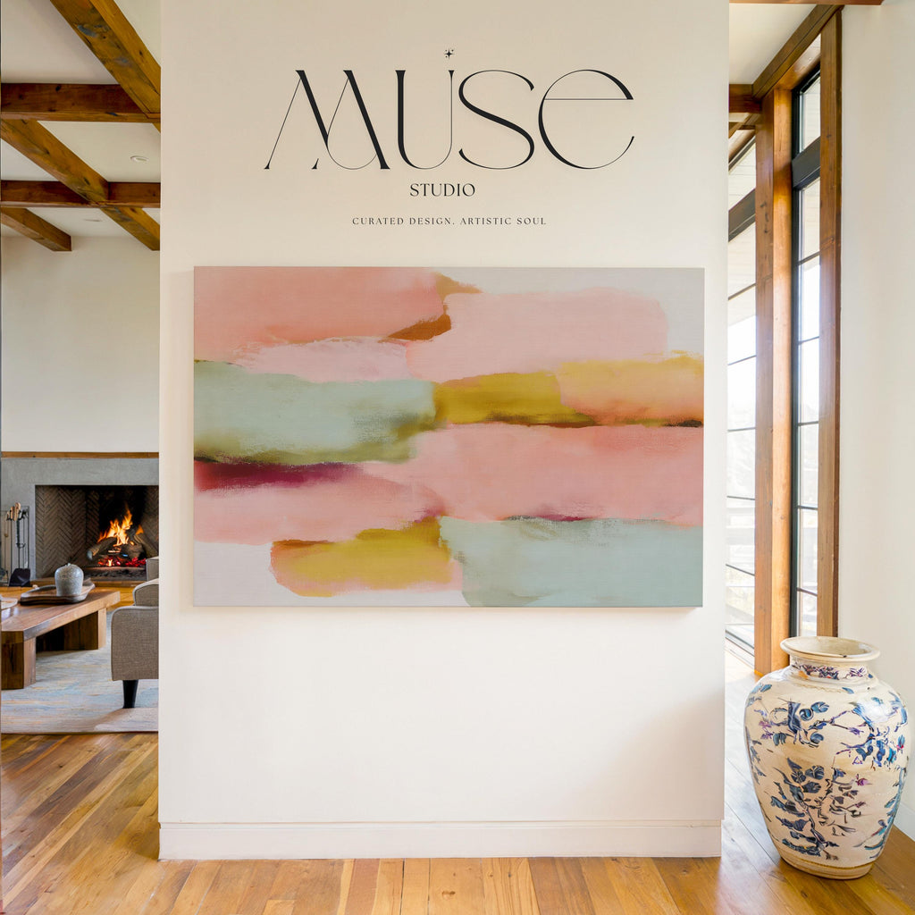 Blush Current No. 1011 by Muse Studio & Co. pastel minimal abstract canvas wall art in blush pink, soft teal, pale aqua, and warm butter yellow, printed with museum-grade giclée inks on premium gallery-wrapped artist canvas and styled as large horizontal pastel wall decor in a warm modern living room with wood beams and natural textures.