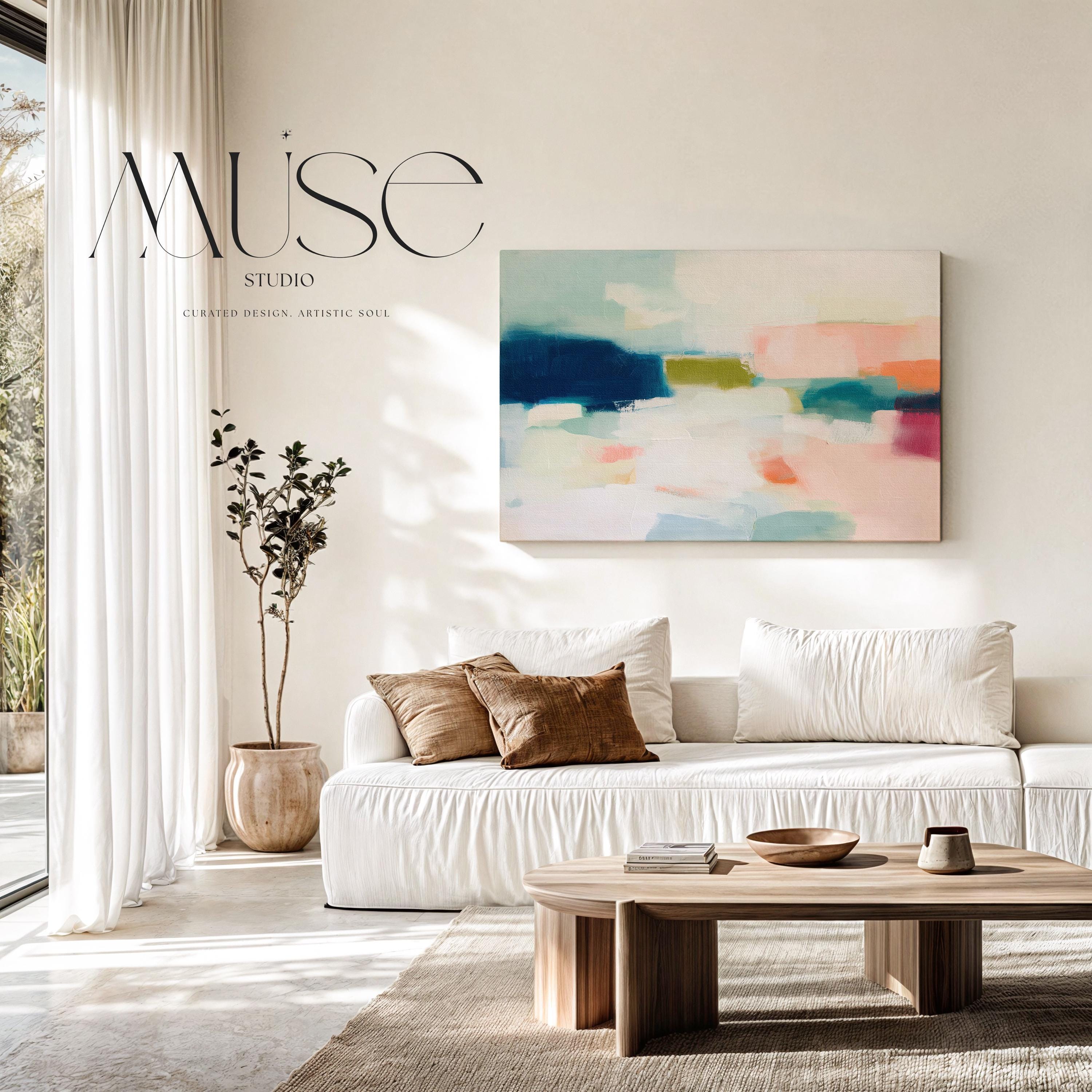 Harbor Light No. 1013 by Muse Studio & Co. large horizontal abstract canvas wall art in navy blue and blush pink tones, printed with museum-grade giclée inks on premium gallery-wrapped artist canvas and styled as modern coastal wall decor in a serene designer living room.