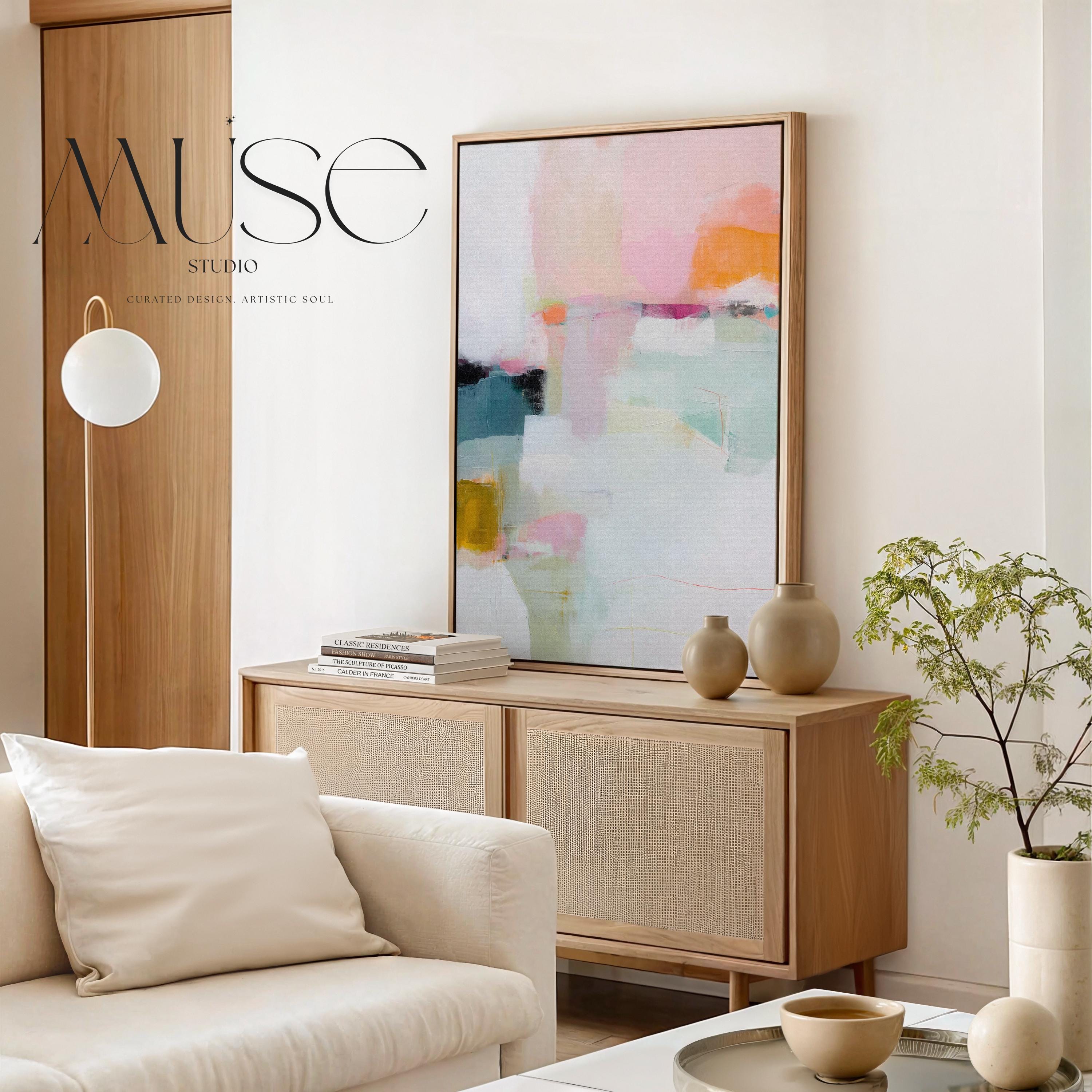 Large vertical abstract framed canvas wall art featuring blush pink, pale mint green, muted teal, warm ochre, coral accents, and layered white brushstrokes, styled in a modern neutral bedroom, offering soft contemporary color and elegant vertical balance.