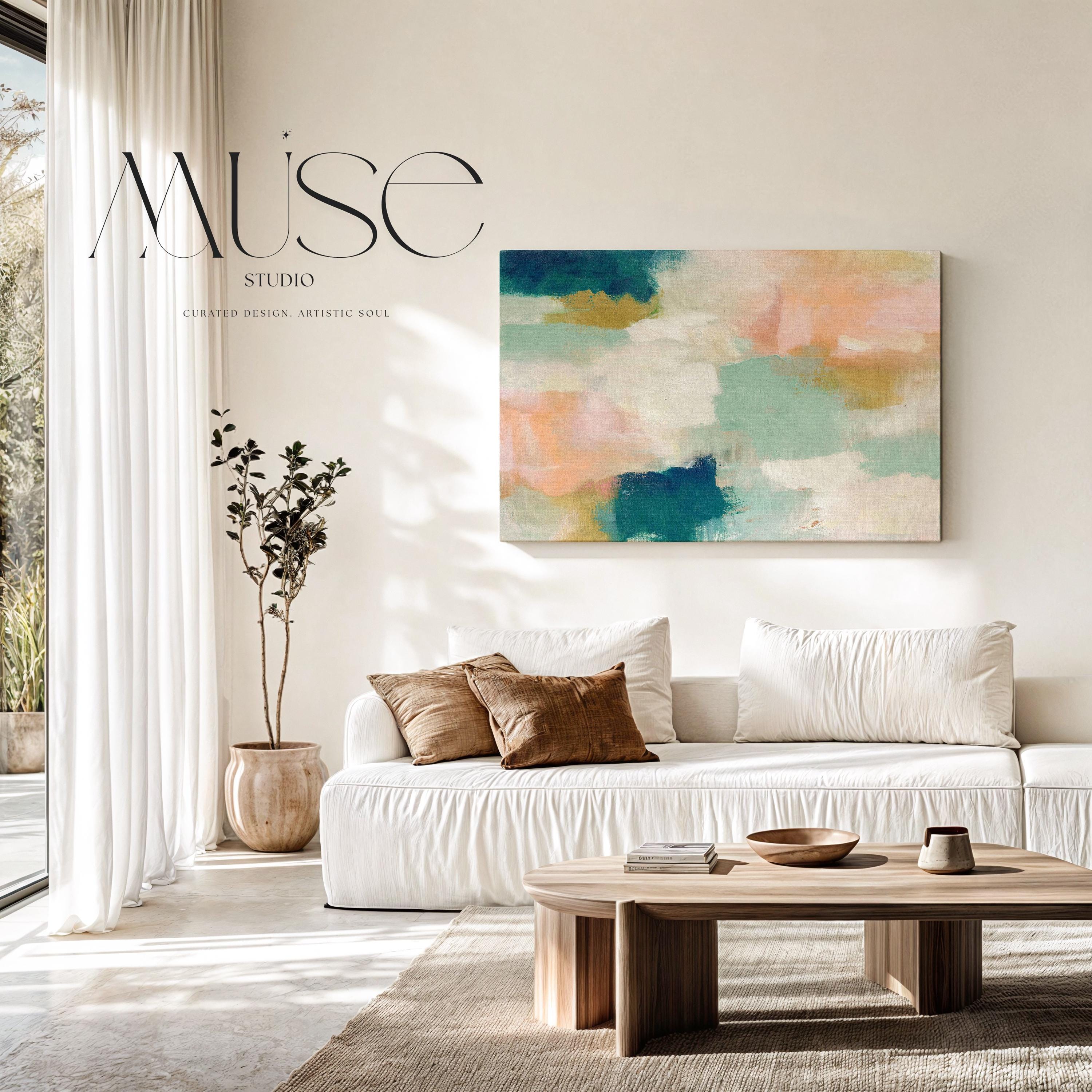 Large horizontal abstract canvas wall art featuring teal blue, mint green, soft peach, and warm sand tones layered over cream, designed for above couch placement, bringing airy color balance and painterly texture to a living room or bedroom wall.