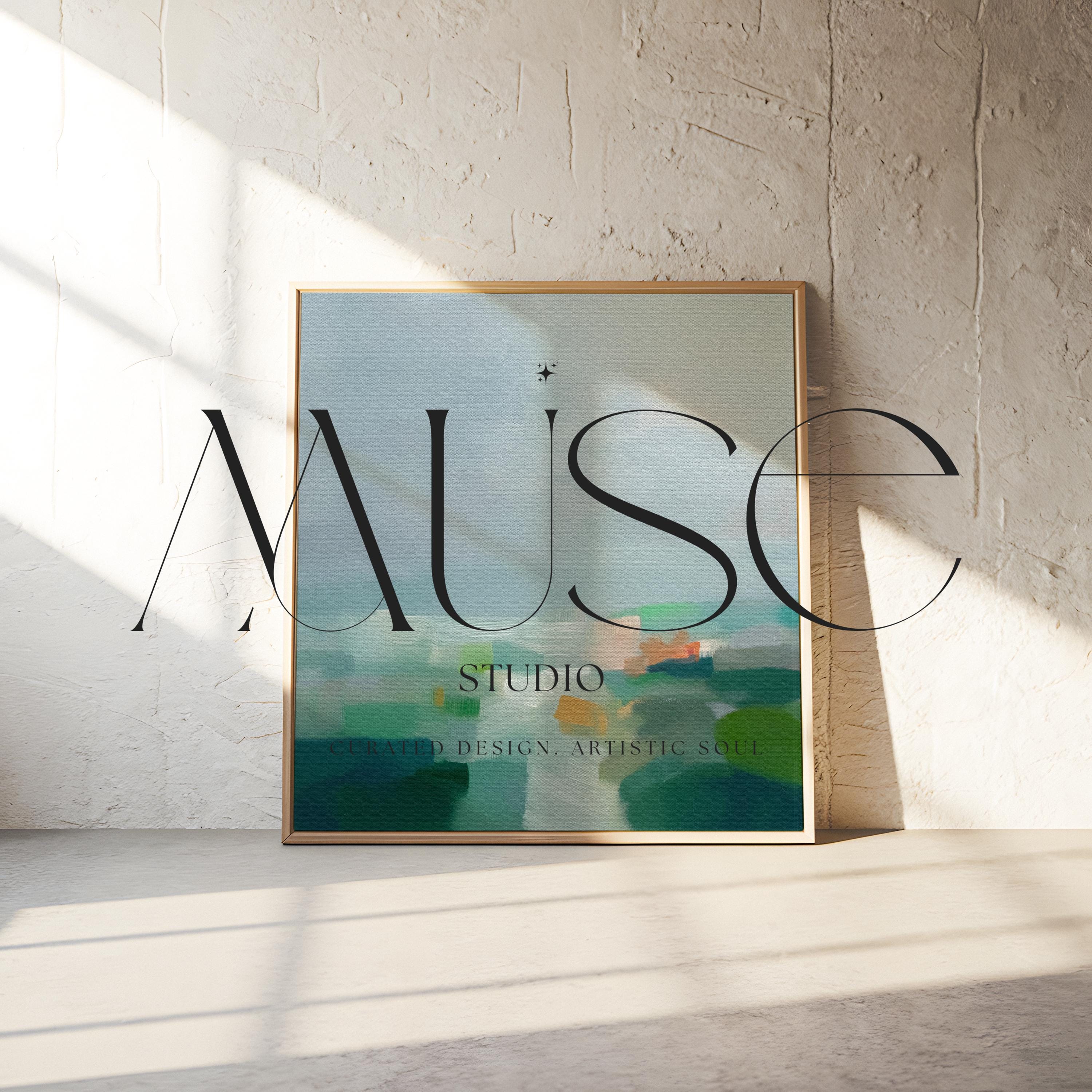 Large square framed canvas wall art in sage green, soft blue, and muted cream tones styled in a warm neutral farmhouse interior, creating a calm countryside-inspired focal point with soft horizon depth.
