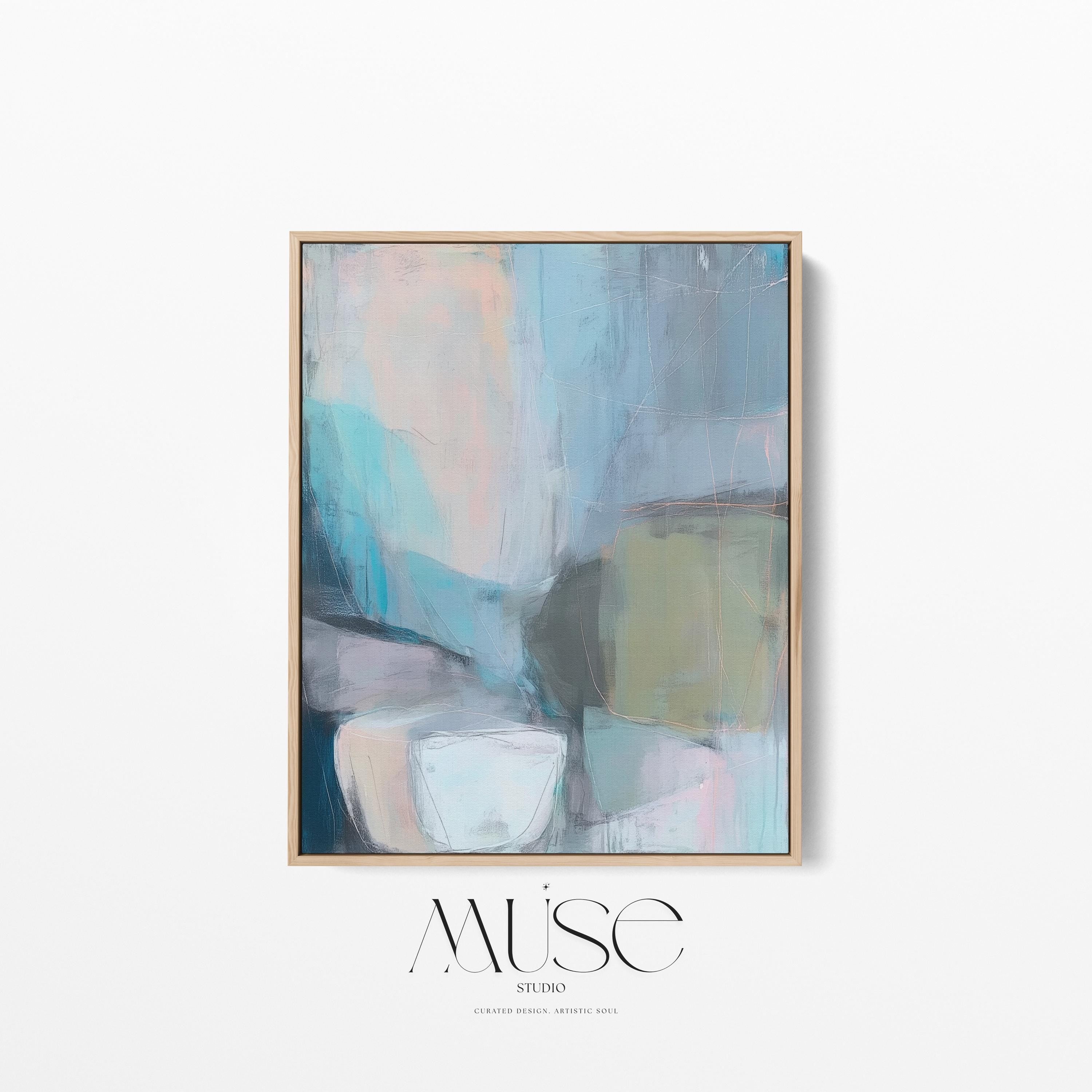 Muse Studio framed vertical abstract wall art in layered teal, blush, gray, and muted olive tones, printed with museum-grade giclée inks on premium gallery-wrapped canvas and finished in a natural wood floating frame for refined organic transitional interiors.