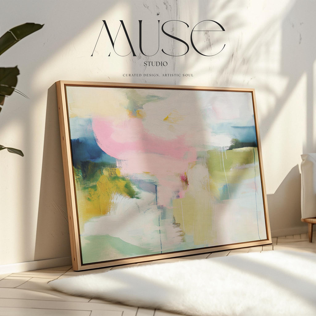Muse Studio large framed canvas wall art featuring a soft pastel abstract composition in blush pink, olive, mint, mustard, and sky tones, printed with museum-grade giclée inks on premium artist canvas for living room decor.
