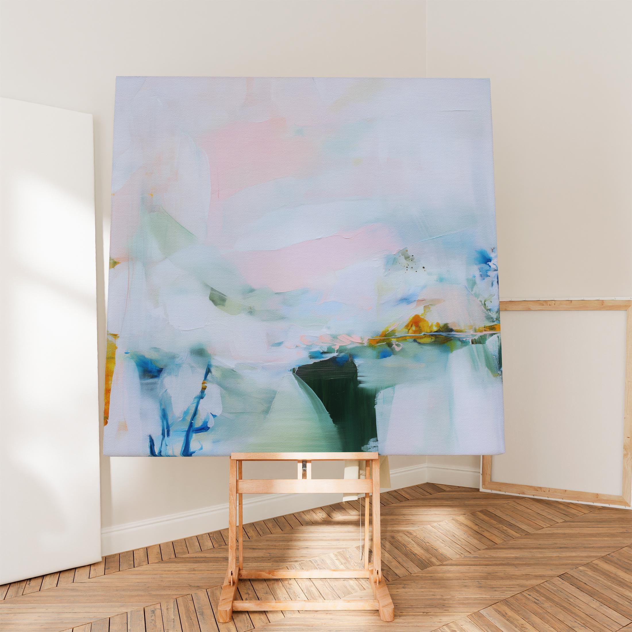 Muse Studio large abstract canvas wall art featuring blush, misted blue, soft sage, deep teal, and warm ochre accents, printed with museum-quality giclée inks on premium artist-grade gallery-wrapped canvas, styled above a linen bed in a calm organic transitional bedroom with natural wood and textured neutral decor.