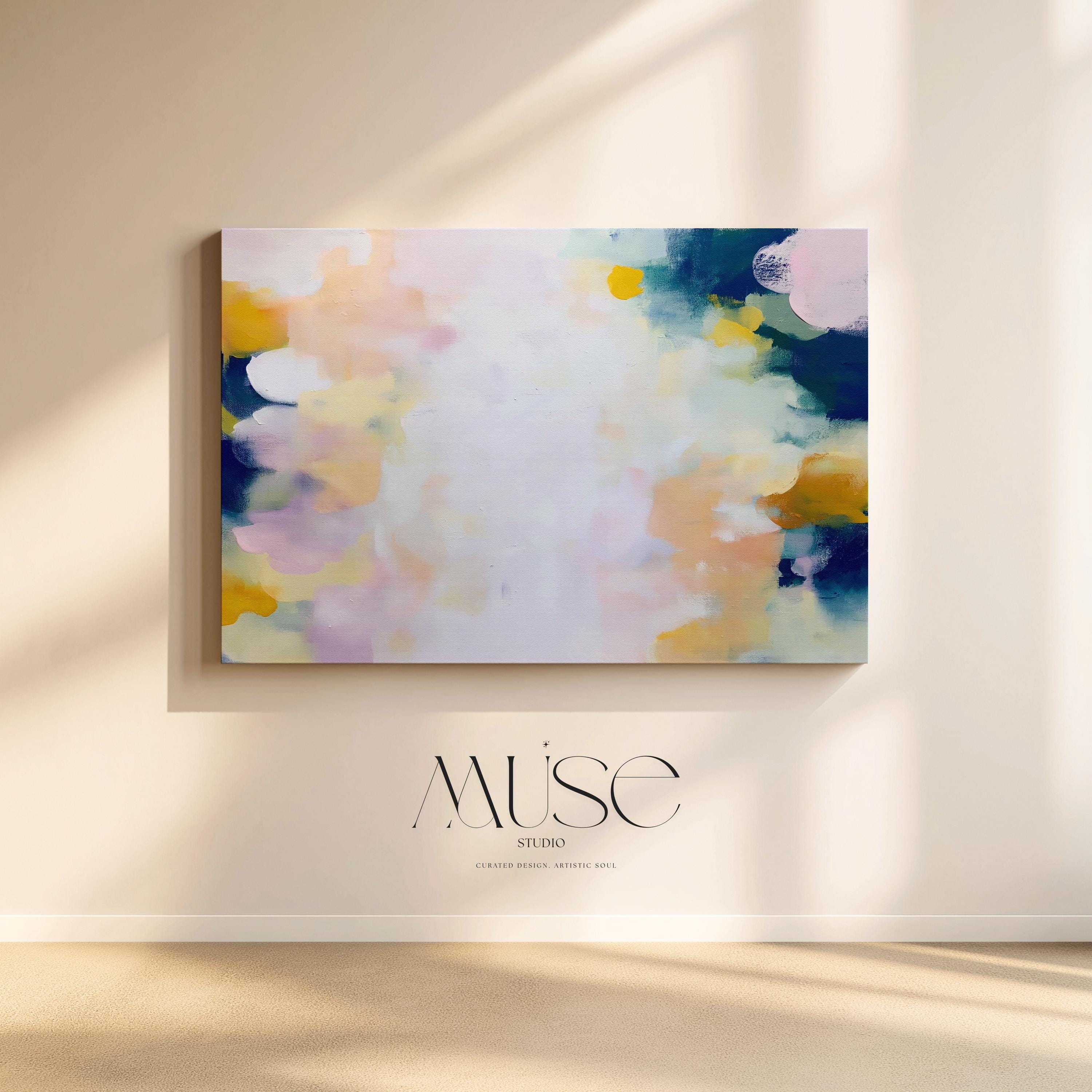 Muse Studio large horizontal abstract canvas wall art printed with museum-grade giclée inks on premium gallery-wrapped canvas, featuring blush and navy pastel tones in an Organic Transitional style, styled above a bed in a serene coastal bedroom.