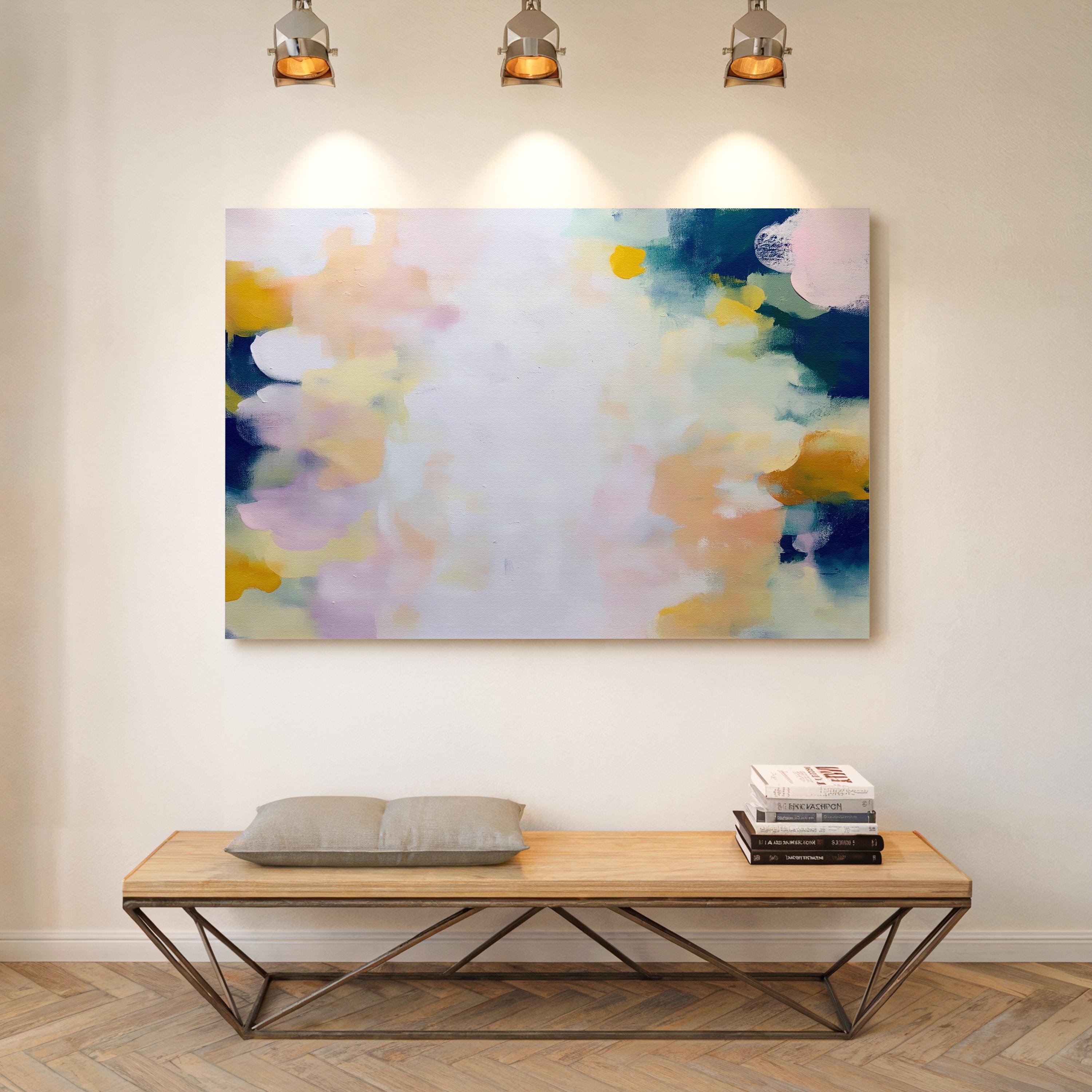 Muse Studio large horizontal abstract canvas wall art printed with museum-grade giclée inks on premium gallery-wrapped canvas, featuring blush and navy pastel tones in an Organic Transitional style, styled above a bed in a serene coastal bedroom.