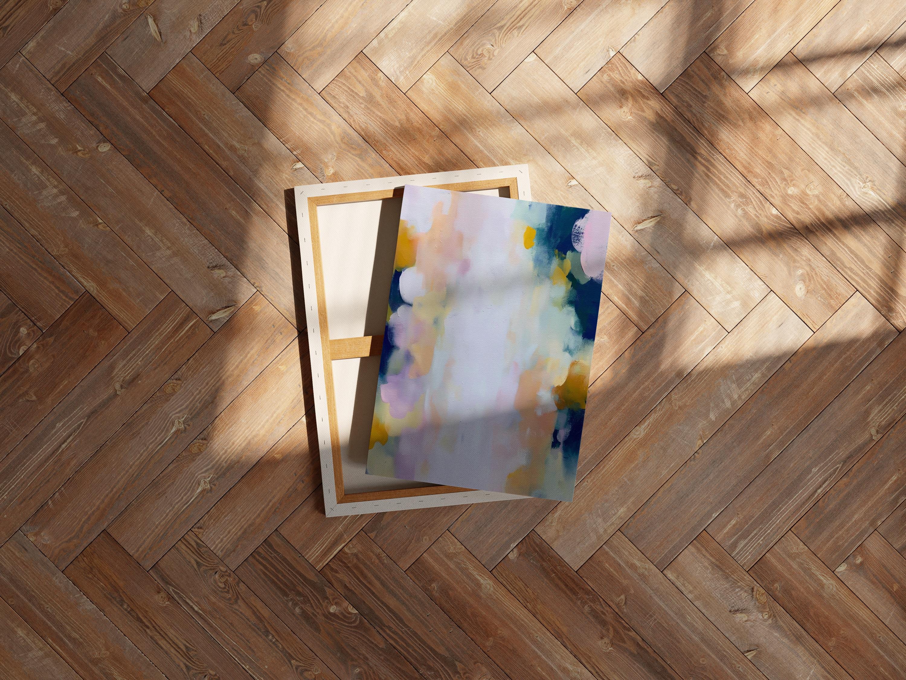 Muse Studio large vertical abstract canvas wall art printed with museum-grade giclée inks on premium gallery-wrapped canvas, featuring blush and navy pastel tones in an Organic Transitional style, styled above a dresser in a serene coastal bedroom.