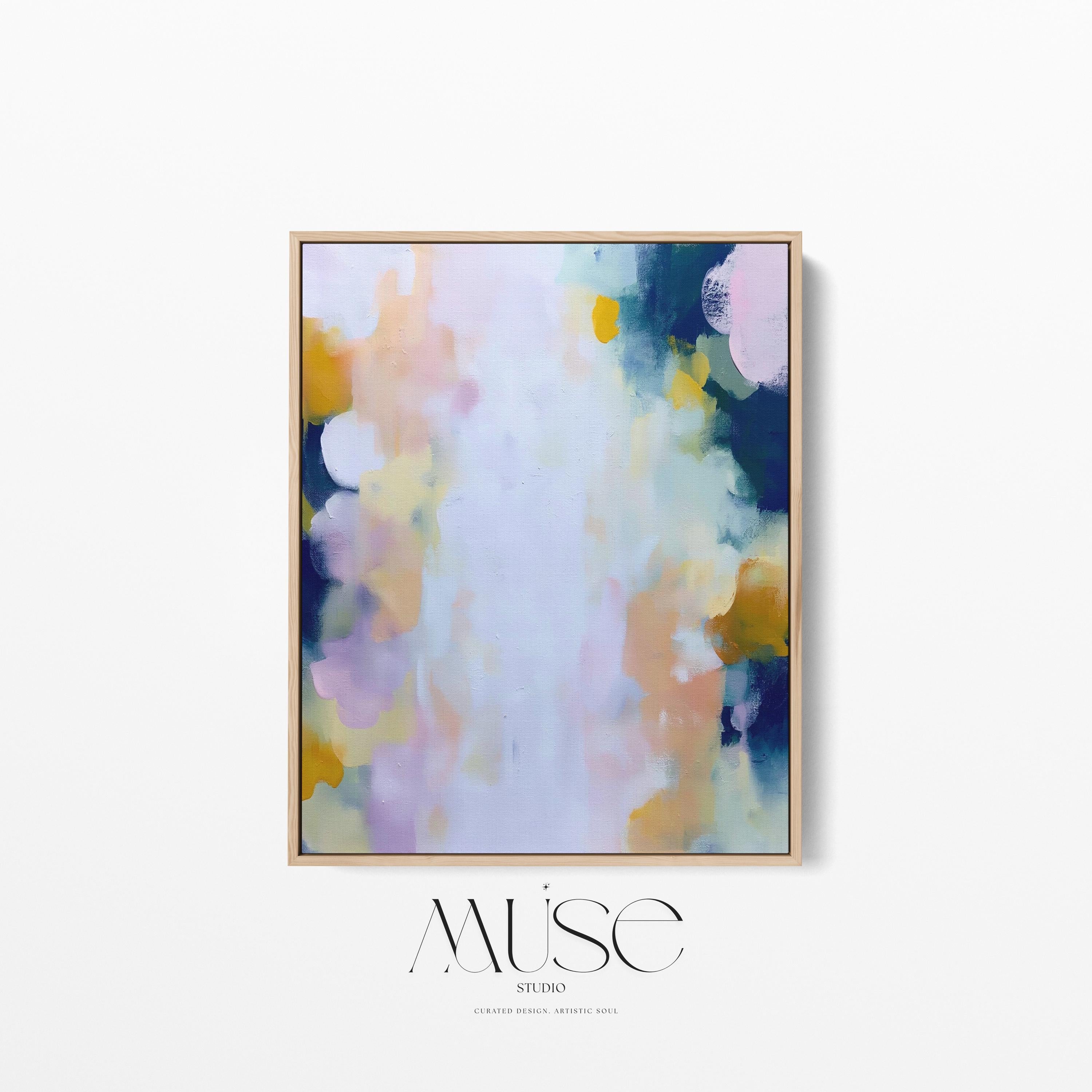 Muse Studio large vertical abstract canvas wall art printed with museum-grade giclée inks on premium gallery-wrapped canvas, featuring blush and navy pastel tones in an Organic Transitional style, styled above a dresser in a serene coastal bedroom.
