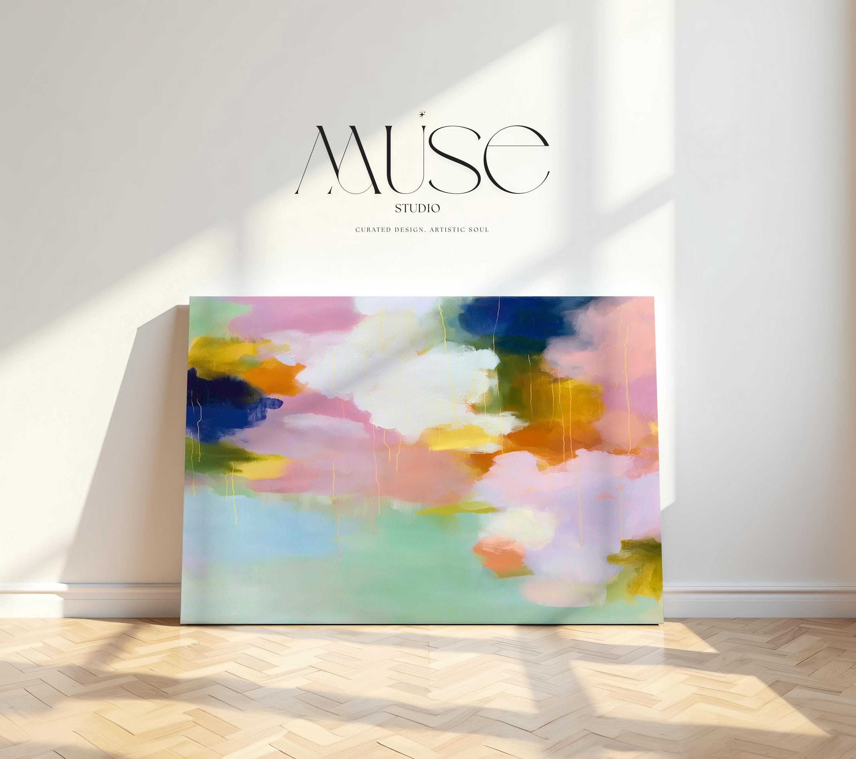 Muse Studio large horizontal abstract canvas wall art printed with museum-grade giclée inks on premium gallery-wrapped canvas, featuring blush, citrus, and navy pastel tones in a Soft Contemporary Pastel style, styled above a linen sofa in a coastal living room.