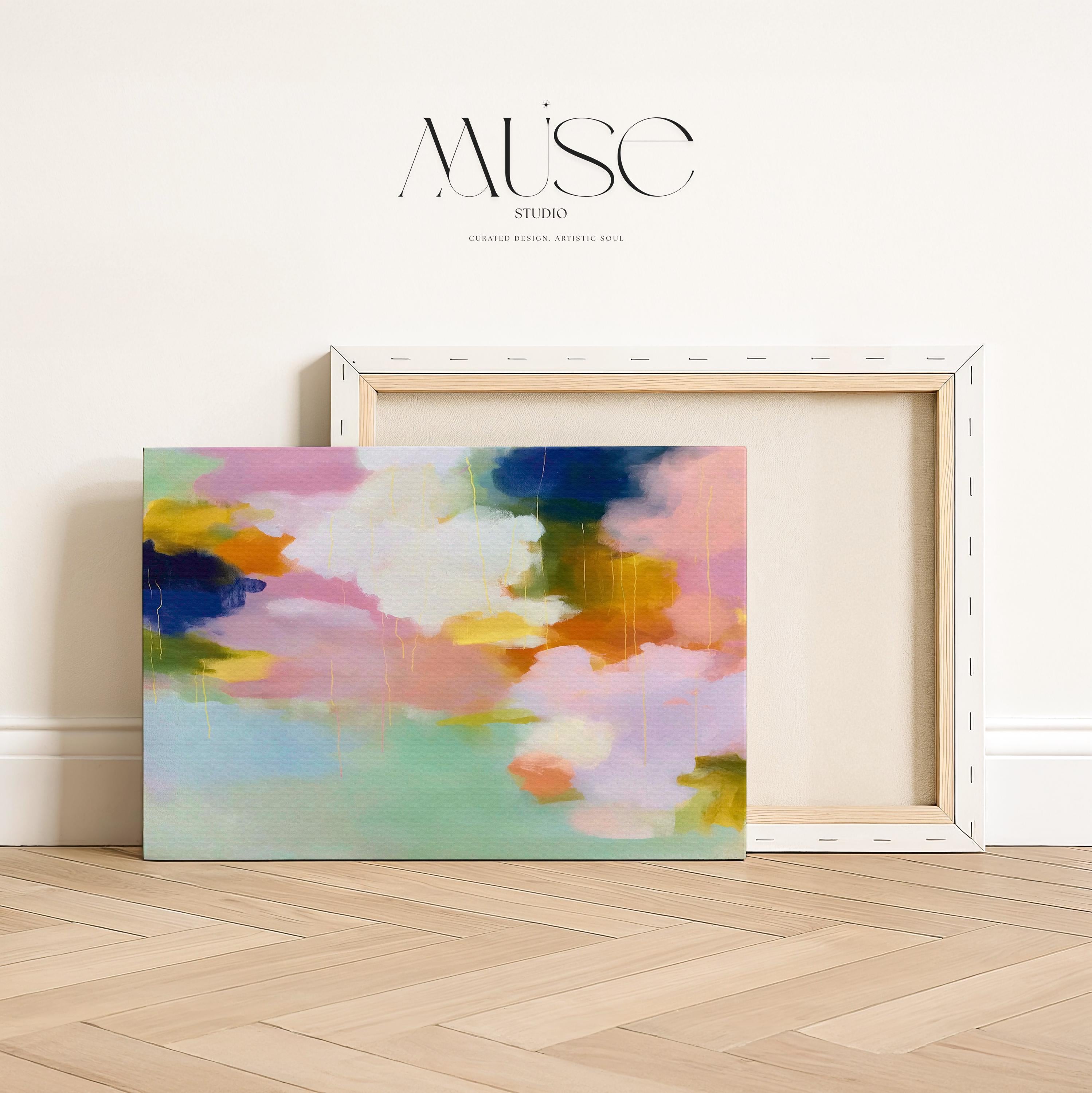 Muse Studio large horizontal abstract canvas wall art printed with museum-grade giclée inks on premium gallery-wrapped canvas, featuring blush, citrus, and navy pastel tones in a Soft Contemporary Pastel style, styled above a linen sofa in a coastal living room.