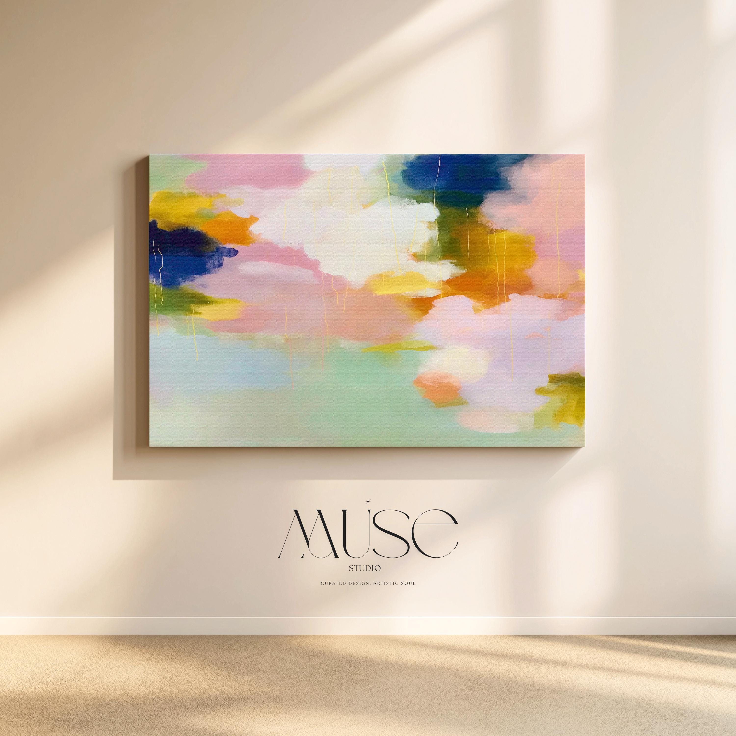 Muse Studio large horizontal abstract canvas wall art printed with museum-grade giclée inks on premium gallery-wrapped canvas, featuring blush, citrus, and navy pastel tones in a Soft Contemporary Pastel style, styled above a linen sofa in a coastal living room.
