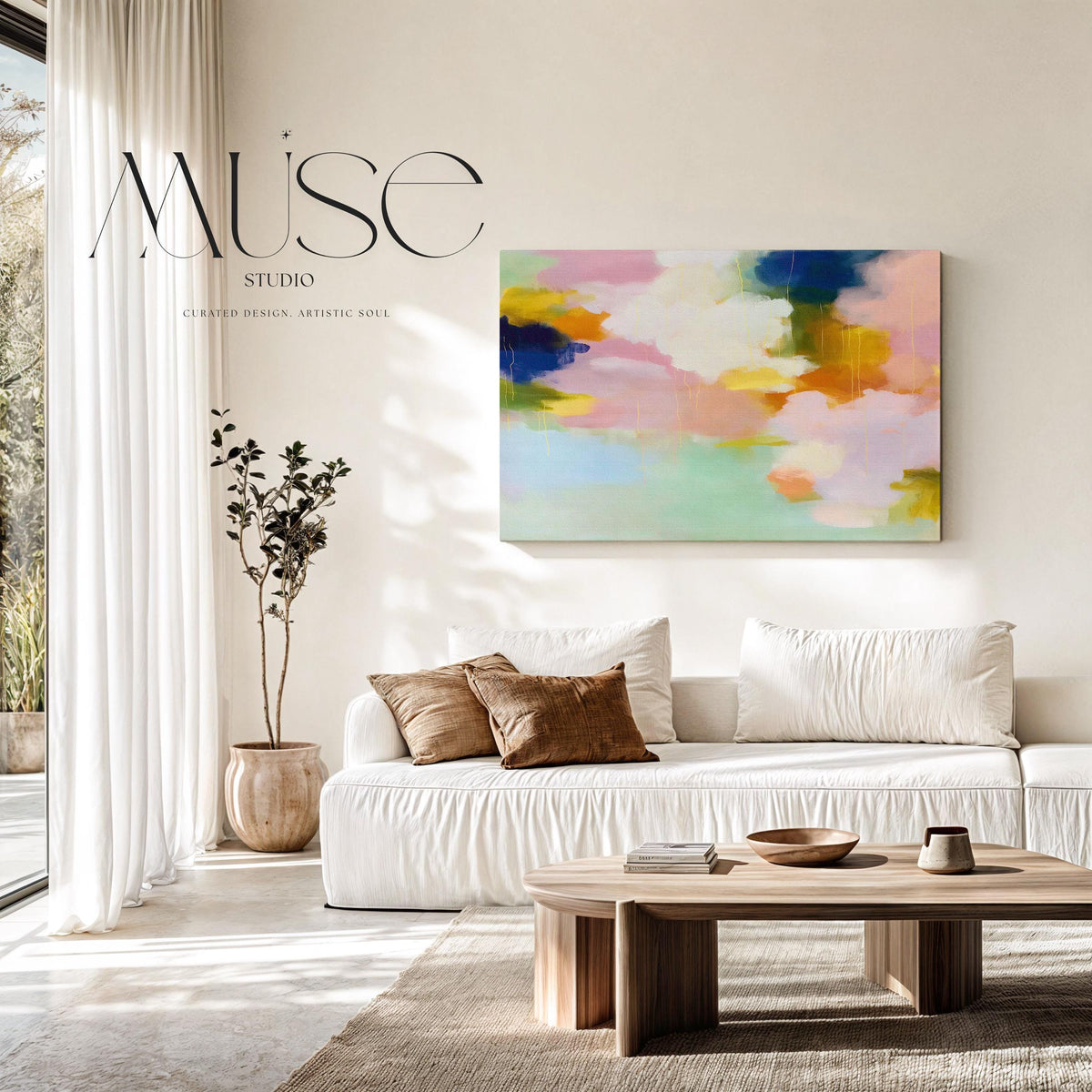 Muse Studio large horizontal abstract canvas wall art printed with museum-grade giclée inks on premium gallery-wrapped canvas, featuring blush, citrus, and navy pastel tones in a Soft Contemporary Pastel style, styled above a linen sofa in a coastal living room.