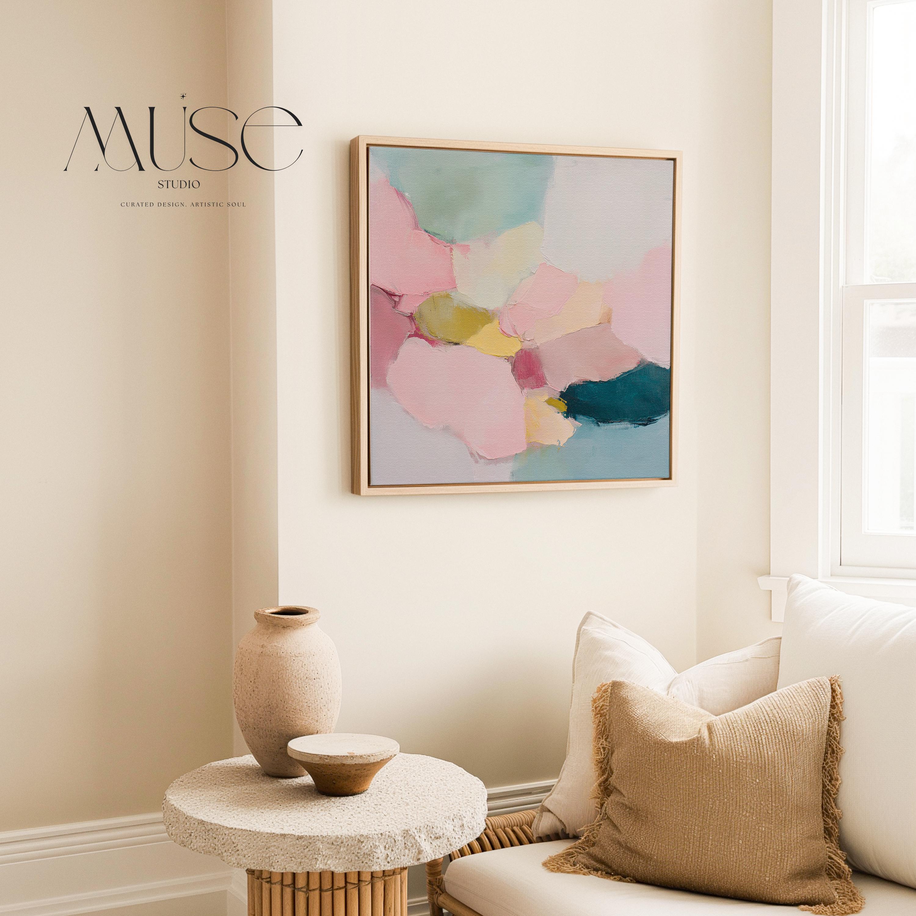Blush Current No. 1010 by Muse Studio vertical pastel abstract wall art in blush pink, teal, and soft sage tones, printed with museum-grade giclée inks on premium gallery-wrapped artist canvas and framed in a natural wood float frame, styled as square pastel minimal wall decor in a serene designer bedroom with custom frame options in natural, white, black, antique gold, and antique silver.