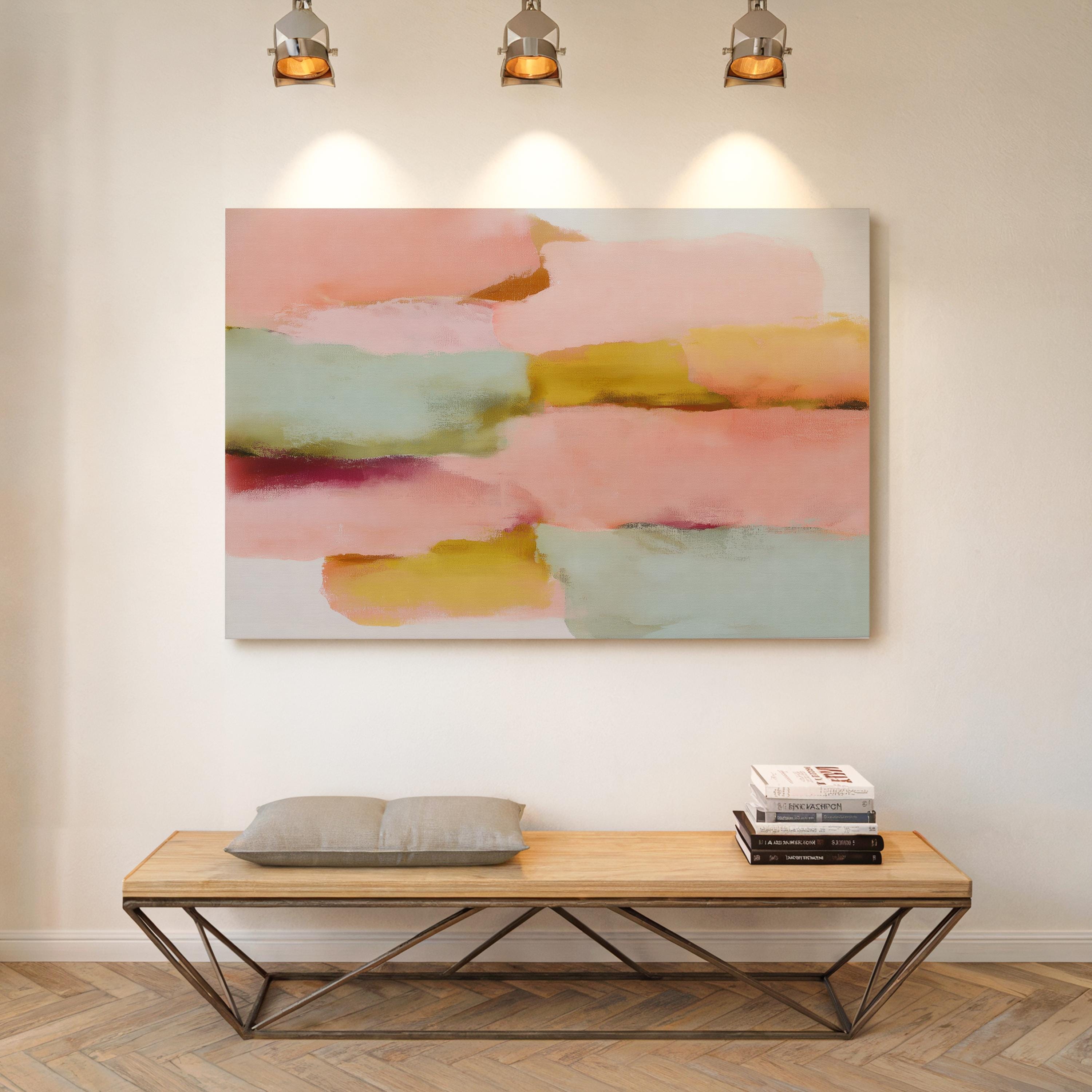Blush Current No. 1011 by Muse Studio & Co. pastel minimal abstract canvas wall art in blush pink, soft teal, pale aqua, and warm butter yellow, printed with museum-grade giclée inks on premium gallery-wrapped artist canvas and styled as large horizontal pastel wall decor in a warm modern living room with wood beams and natural textures.