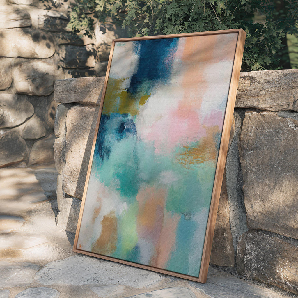 Large vertical abstract framed canvas wall art featuring layered teal, soft peach, cream, blush, and muted gold tones, styled for a serene bedroom or above a console table, offering coastal warmth and quiet luxury in a tall modern interior.