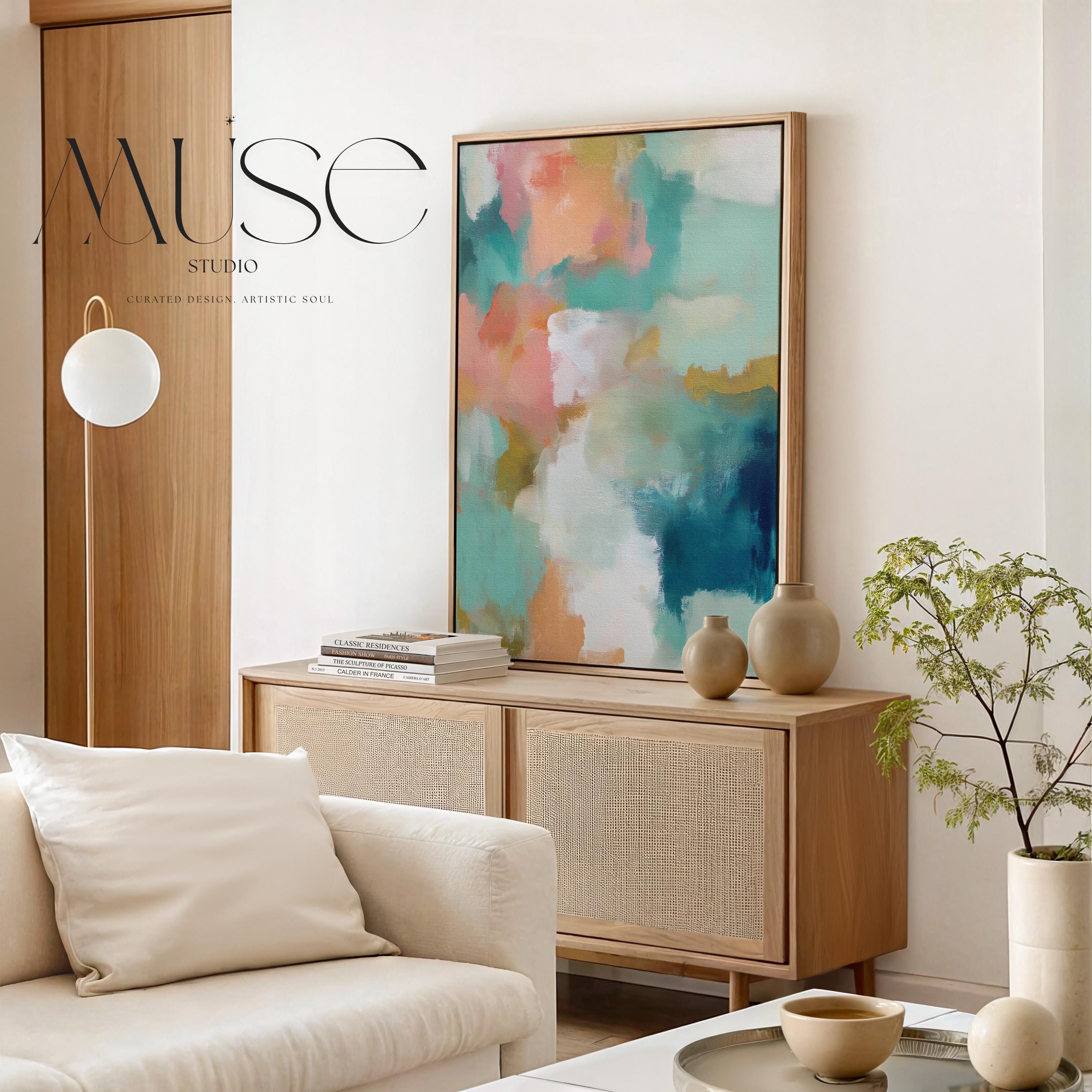 Large vertical abstract framed canvas wall art featuring coral, teal, seafoam green, cream, and soft gold tones, styled for bedroom or above console placement, offering airy coastal color and quiet luxury for tall walls.