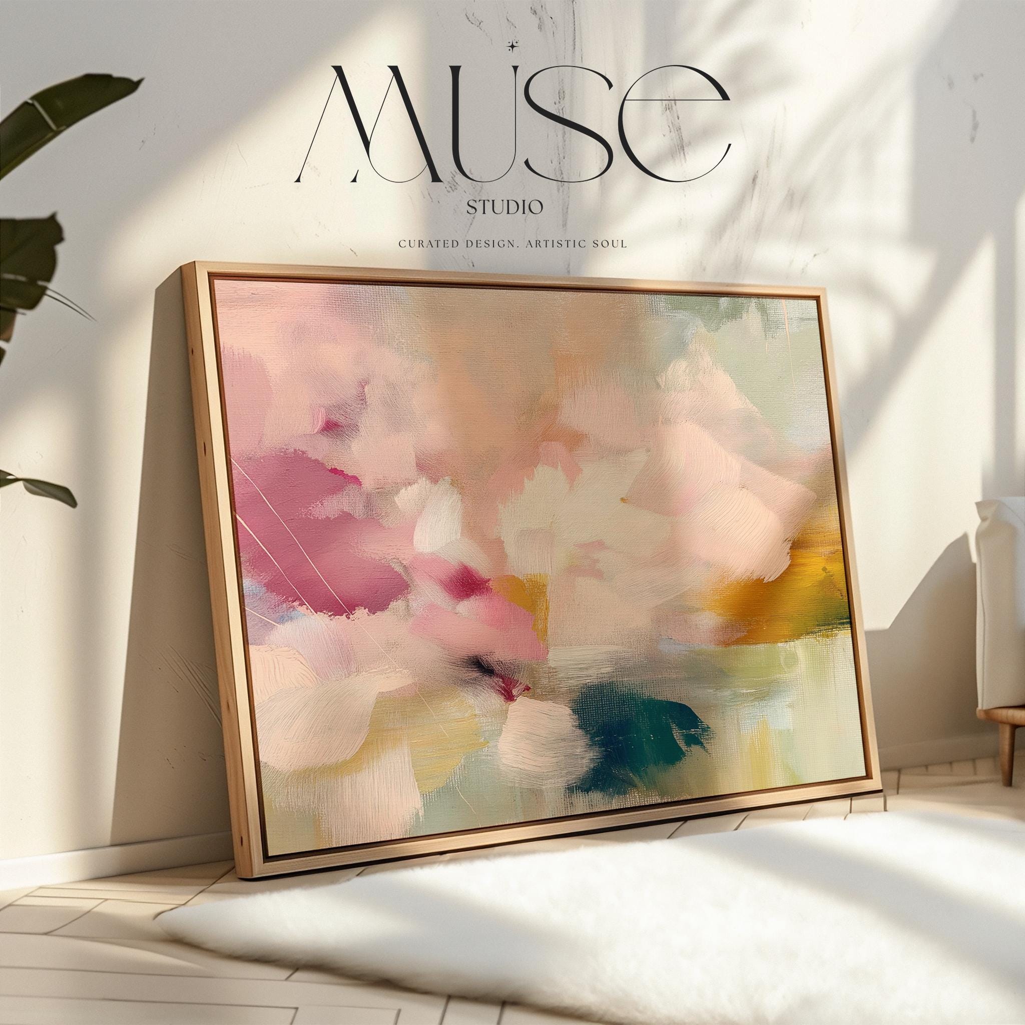 Soft blush, coral, teal and cream floral abstract framed canvas wall art by Muse Studio & Co. in a natural wood floating frame, styled as a calming focal piece in a warm contemporary living space.