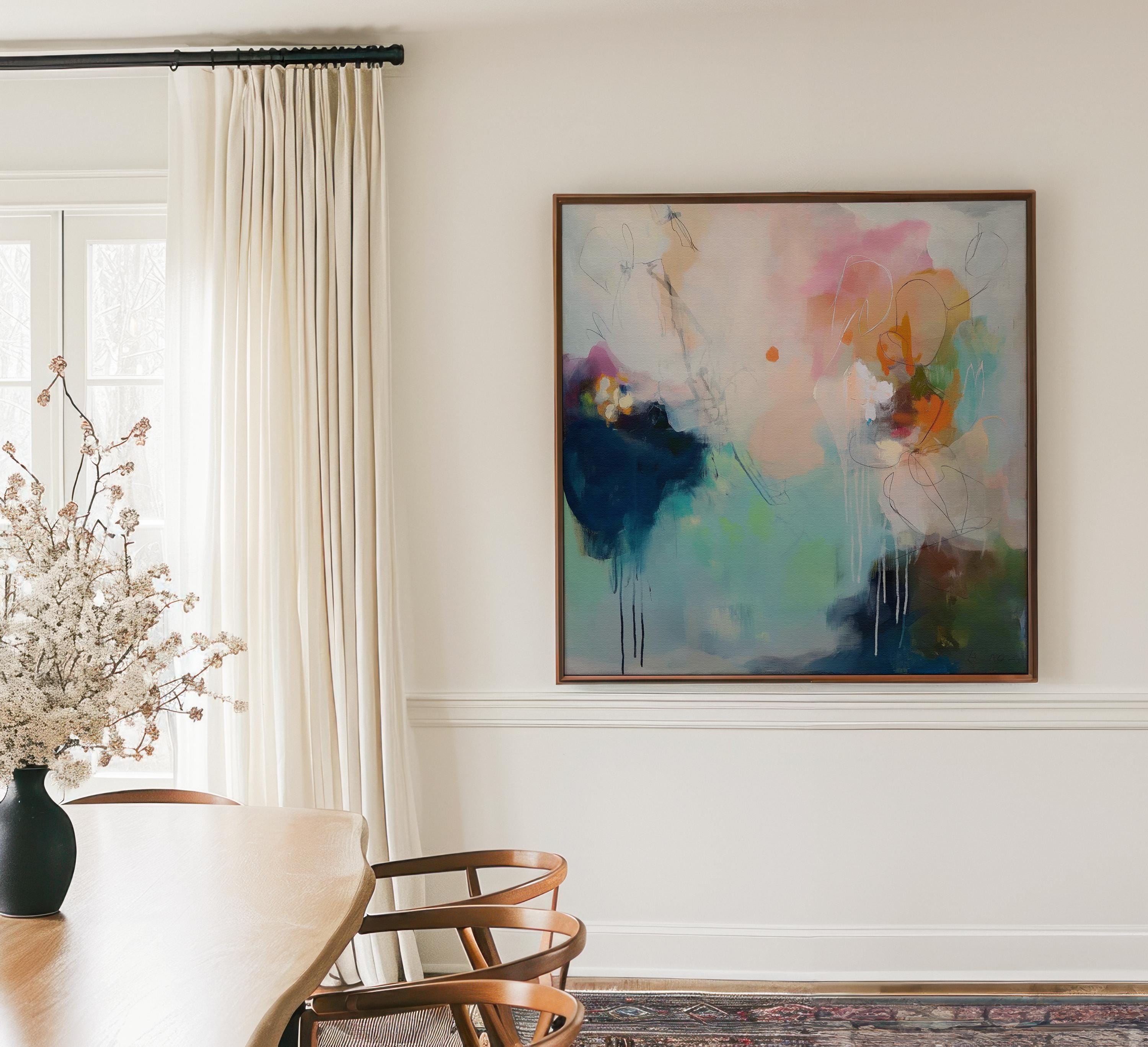 "Abstract coastal painting titled Coastal Interlude No. 1032, featuring soft pastel layers of sea glass green, muted aqua, and blush pink in a contemporary, painterly style." Sea glass blue and blush abstract artwork by Muse Studio & Co. printed as a museum-quality giclée framed canvas with a natural wood floating frame, custom produced in large statement sizes for soft contemporary and coastal neutral interiors.