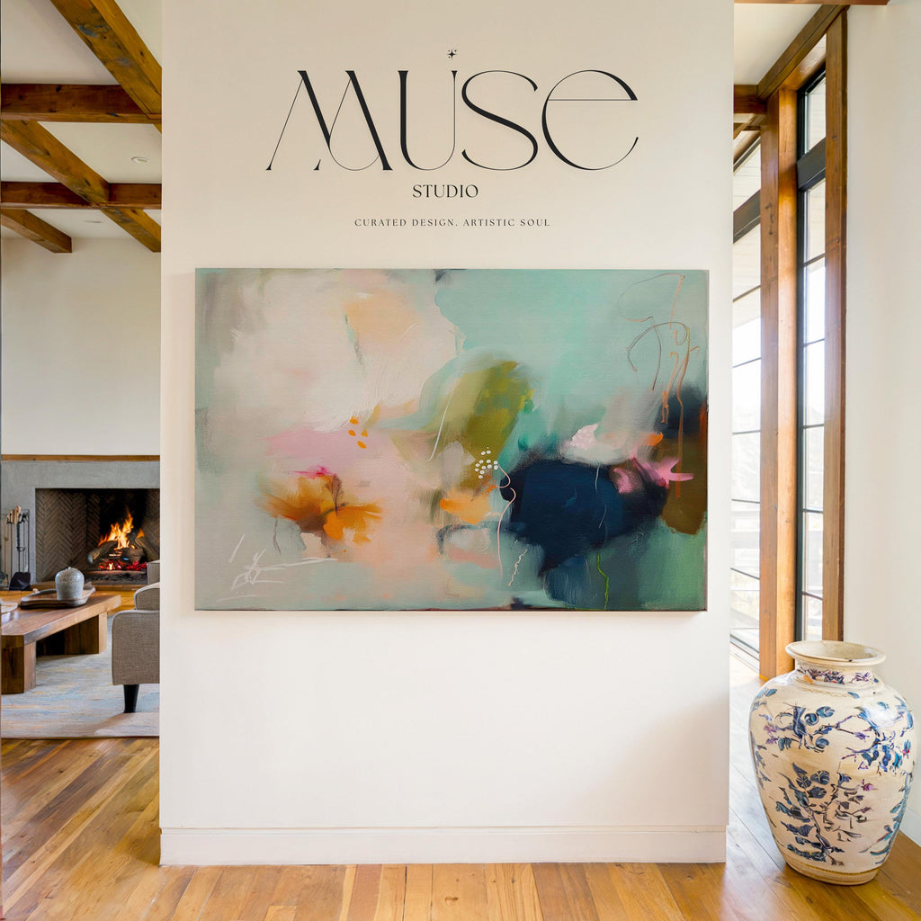 Abstract coastal painting titled Glass Garden, featuring fluid layers of deep navy blue, vibrant teal, and soft blush pink paint on a horizontal canvas Sea glass green and apricot abstract artwork by Muse Studio & Co. printed with archival giclée inks on gallery-wrapped canvas, custom produced in large wall art sizes suited for soft contemporary, coastal neutral, and organic transitional interiors.