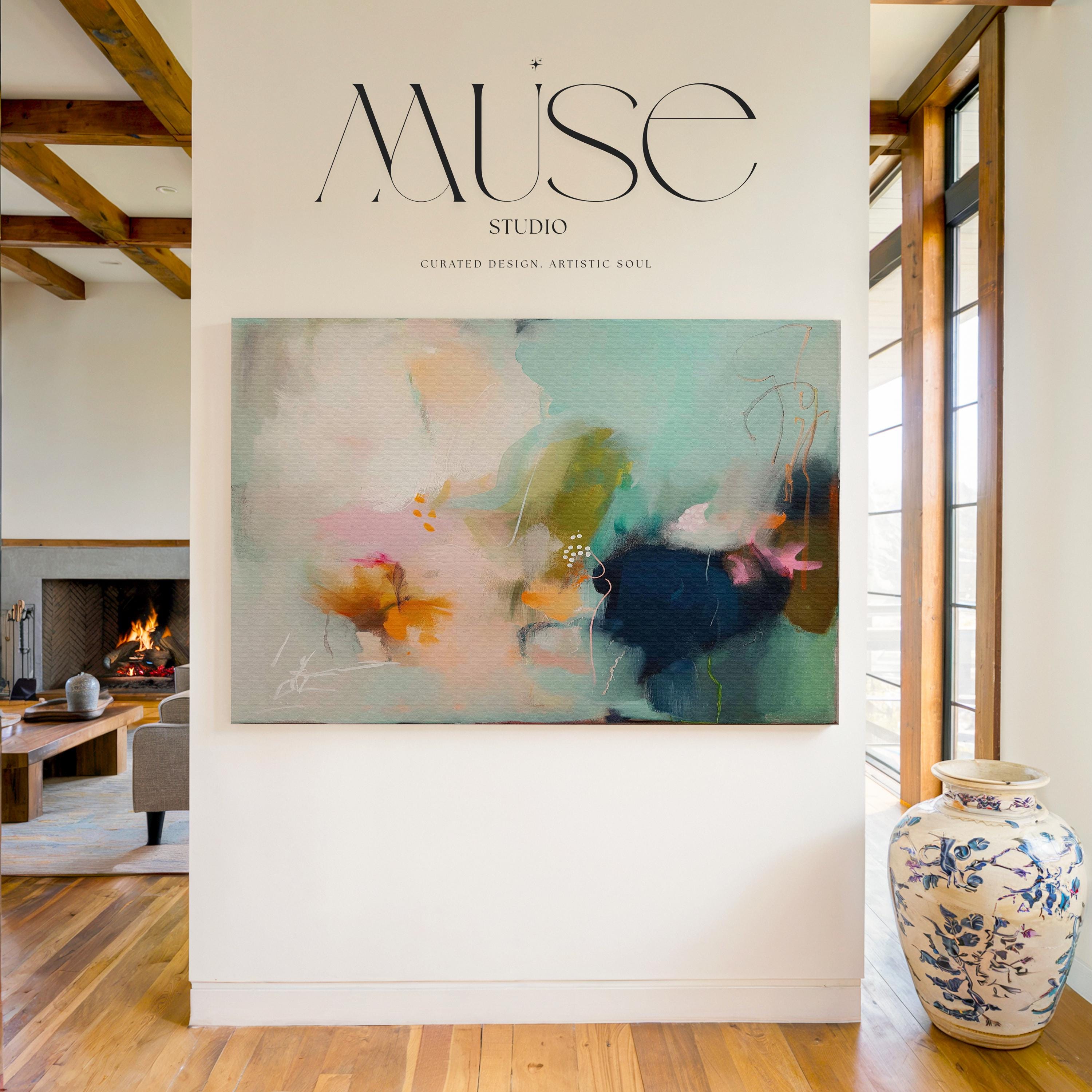 Abstract coastal painting titled Glass Garden, featuring fluid layers of deep navy blue, vibrant teal, and soft blush pink paint on a horizontal canvas Sea glass green and apricot abstract artwork by Muse Studio & Co. printed with archival giclée inks on gallery-wrapped canvas, custom produced in large wall art sizes suited for soft contemporary, coastal neutral, and organic transitional interiors.