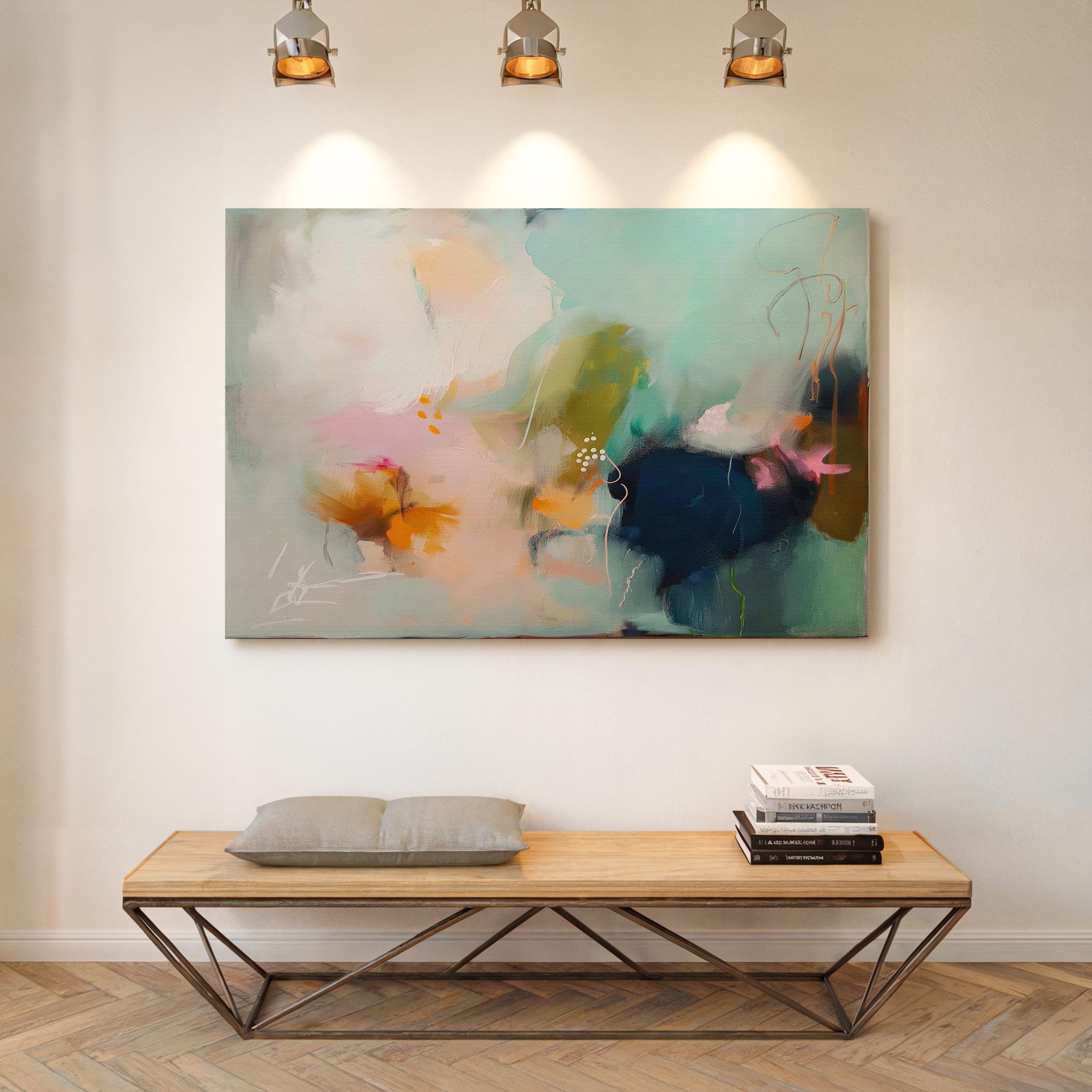 Abstract coastal painting titled Glass Garden, featuring fluid layers of deep navy blue, vibrant teal, and soft blush pink paint on a horizontal canvas Sea glass green and apricot abstract artwork by Muse Studio & Co. printed with archival giclée inks on gallery-wrapped canvas, custom produced in large wall art sizes suited for soft contemporary, coastal neutral, and organic transitional interiors.