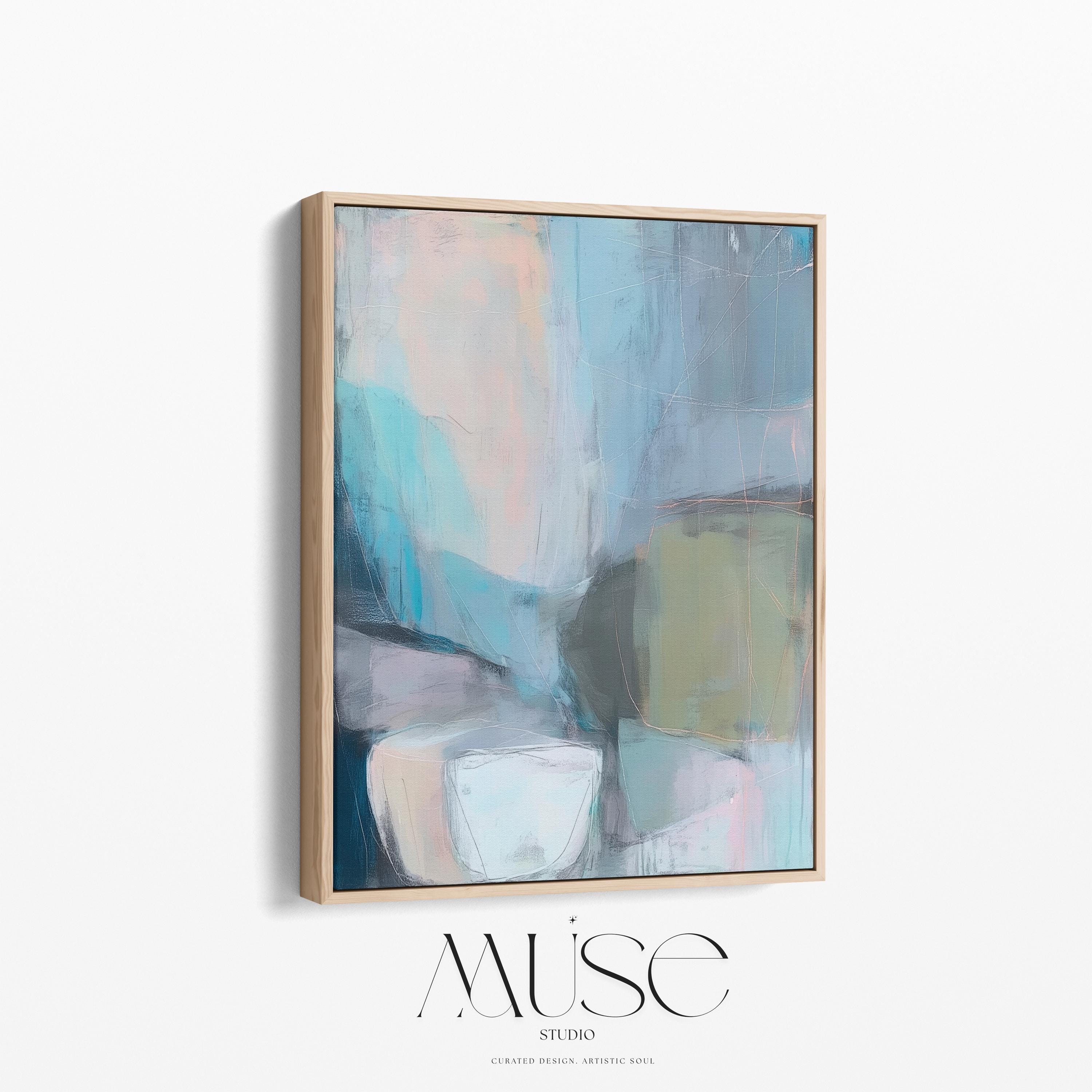 Muse Studio framed vertical abstract wall art in layered teal, blush, gray, and muted olive tones, printed with museum-grade giclée inks on premium gallery-wrapped canvas and finished in a natural wood floating frame for refined organic transitional interiors.