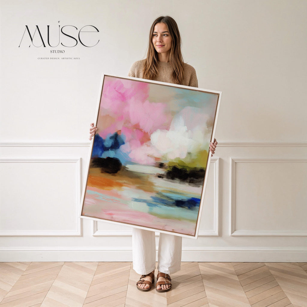 Lythe Daydream 1049 by Muse Studio framed floral abstract wall art inspired by spring gardens, blending blush pink, cream, teal, navy, and soft ochre tones. Printed with museum-grade giclée inks on premium artist canvas and set in a custom wood float frame, styled above a neutral linen bed in a Romantic Botanical bedroom.
