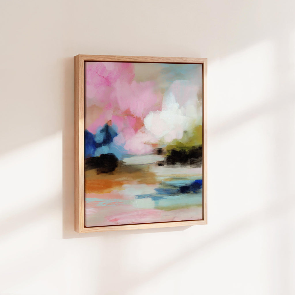Lythe Daydream 1049 by Muse Studio framed floral abstract wall art inspired by spring gardens, blending blush pink, cream, teal, navy, and soft ochre tones. Printed with museum-grade giclée inks on premium artist canvas and set in a custom wood float frame, styled above a neutral linen bed in a Romantic Botanical bedroom.