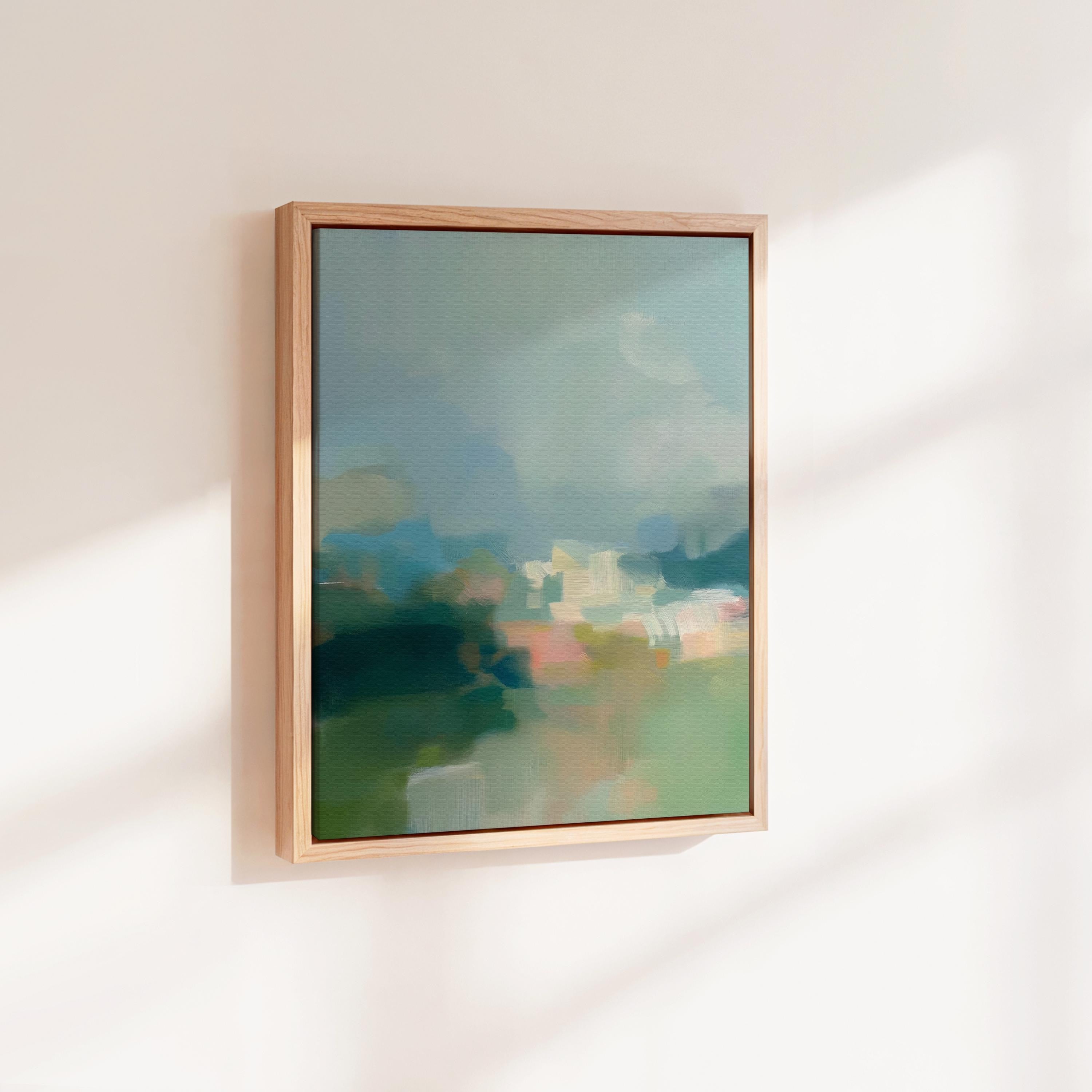 Misty Glade 1045 by Muse Studio vertical abstract landscape wall art inspired by misty woodland clearings, blending sage green, sea glass blue, soft cream, and pale peach light. Printed with museum-grade giclée inks on premium gallery-wrapped artist canvas and available framed in custom wood float frames for serene Organic Transitional interiors.