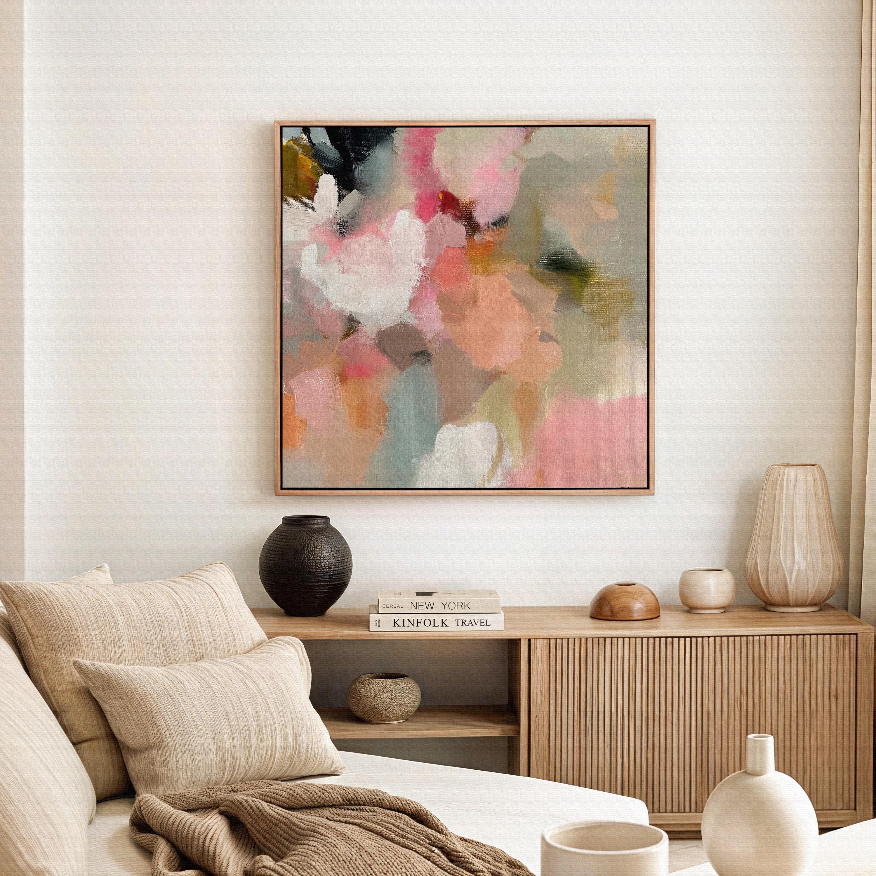 Spring Sonata No. 1047 by Muse Studio & Co. blush pink peach floral abstract wall art printed with museum-grade giclée inks on premium gallery-wrapped cotton canvas and framed in natural wood, styled above a linen bed in a serene designer bedroom with soft botanical decor.