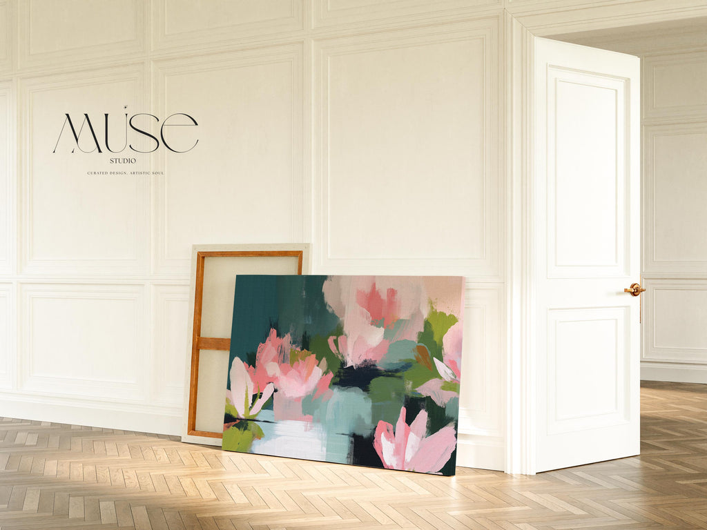 Magnolia Reverie No. 1037 by Muse Studio & Co. blush pink magnolia floral canvas wall art with sage green and deep teal botanical brushwork printed with museum-grade giclée inks on premium gallery-wrapped artist canvas with optional natural, white, black, antique gold, or antique silver float frames to match any decor style, styled in a coastal tropical beach bedroom with soft neutral linens and breezy interiors.