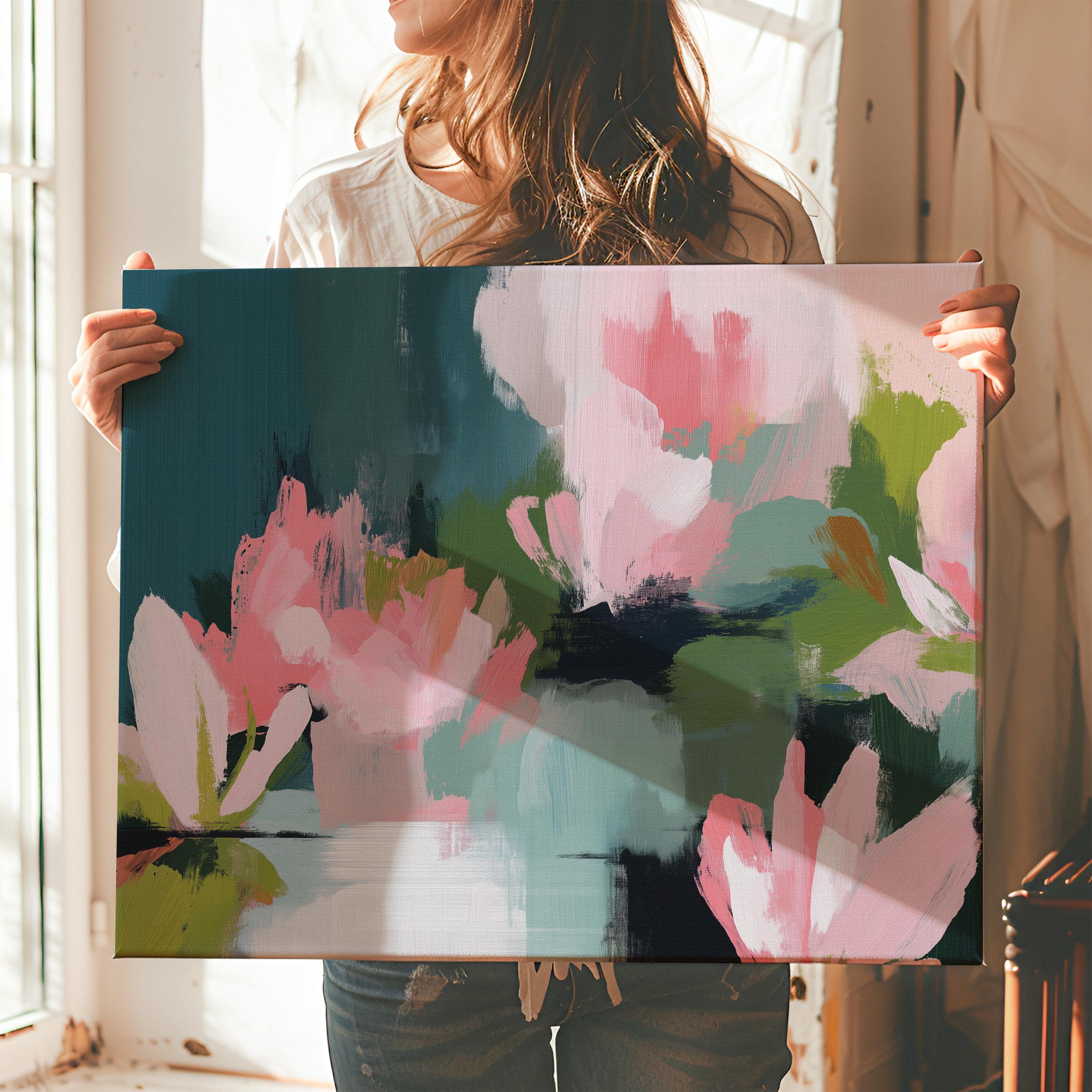 Magnolia Reverie No. 1037 by Muse Studio & Co. blush pink magnolia floral canvas wall art with sage green and deep teal botanical brushwork printed with museum-grade giclée inks on premium gallery-wrapped artist canvas with optional natural, white, black, antique gold, or antique silver float frames to match any decor style, styled in a coastal tropical beach bedroom with soft neutral linens and breezy interiors.