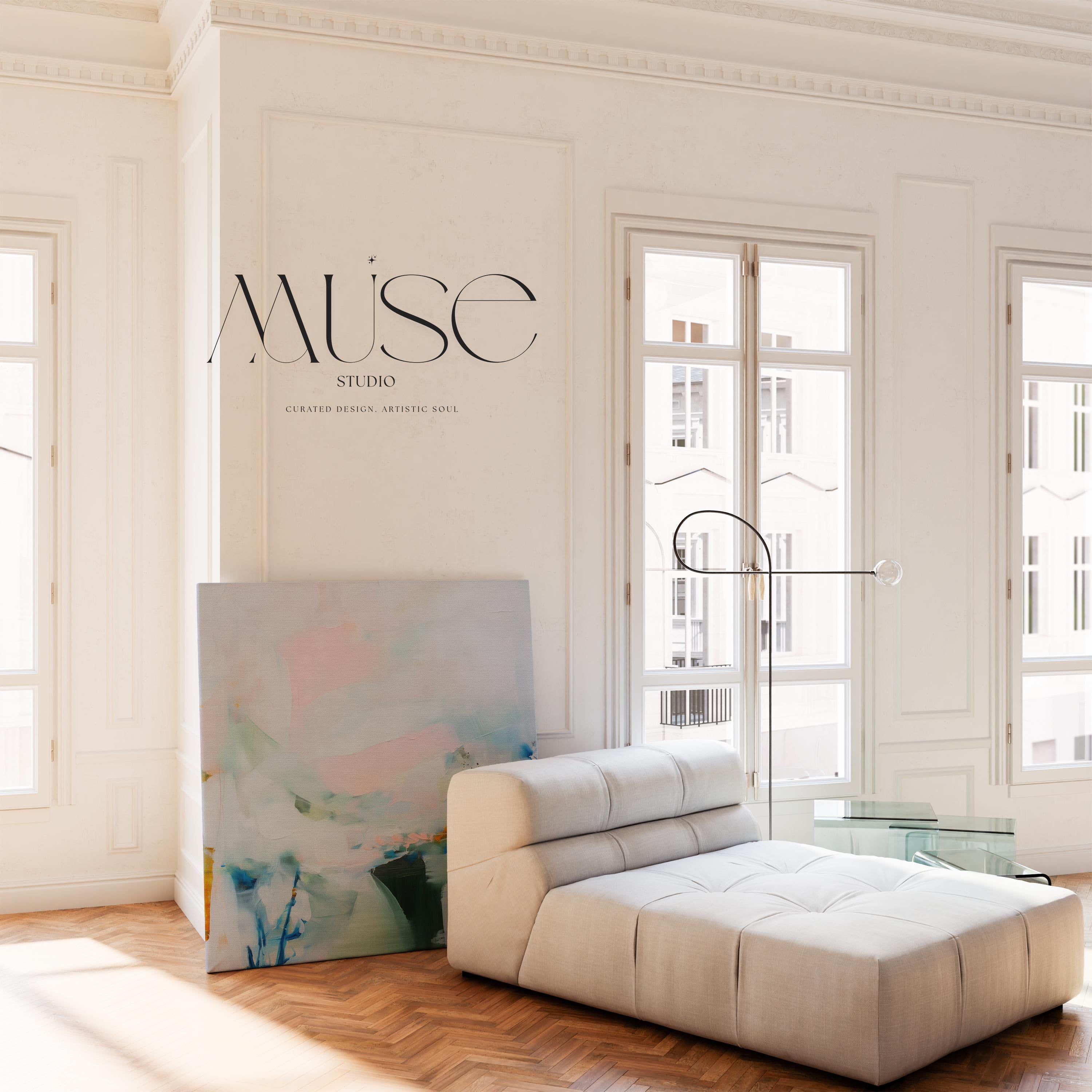 Muse Studio large abstract canvas wall art featuring blush, misted blue, soft sage, deep teal, and warm ochre accents, printed with museum-quality giclée inks on premium artist-grade gallery-wrapped canvas, styled above a linen bed in a calm organic transitional bedroom with natural wood and textured neutral decor.
