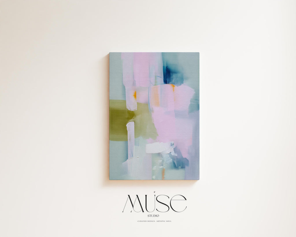 Muse Studio large vertical abstract canvas wall art printed with museum-grade giclée inks on premium gallery-wrapped canvas, featuring blush and sage pastel tones in an Organic Transitional style, styled above a bed in a serene coastal bedroom.