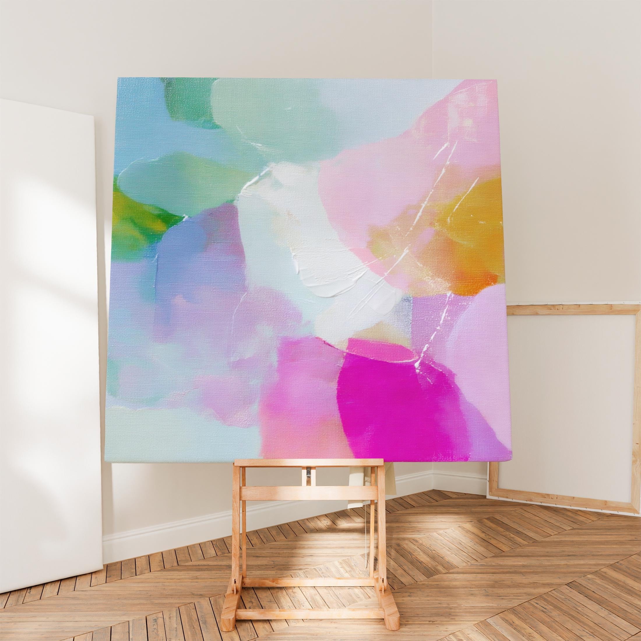 Muse Studio large square abstract canvas wall art printed with museum-grade giclée inks on premium gallery-wrapped canvas, featuring blush and aqua pastel tones in a Soft Contemporary Pastel style, styled above a bed in a serene bedroom.