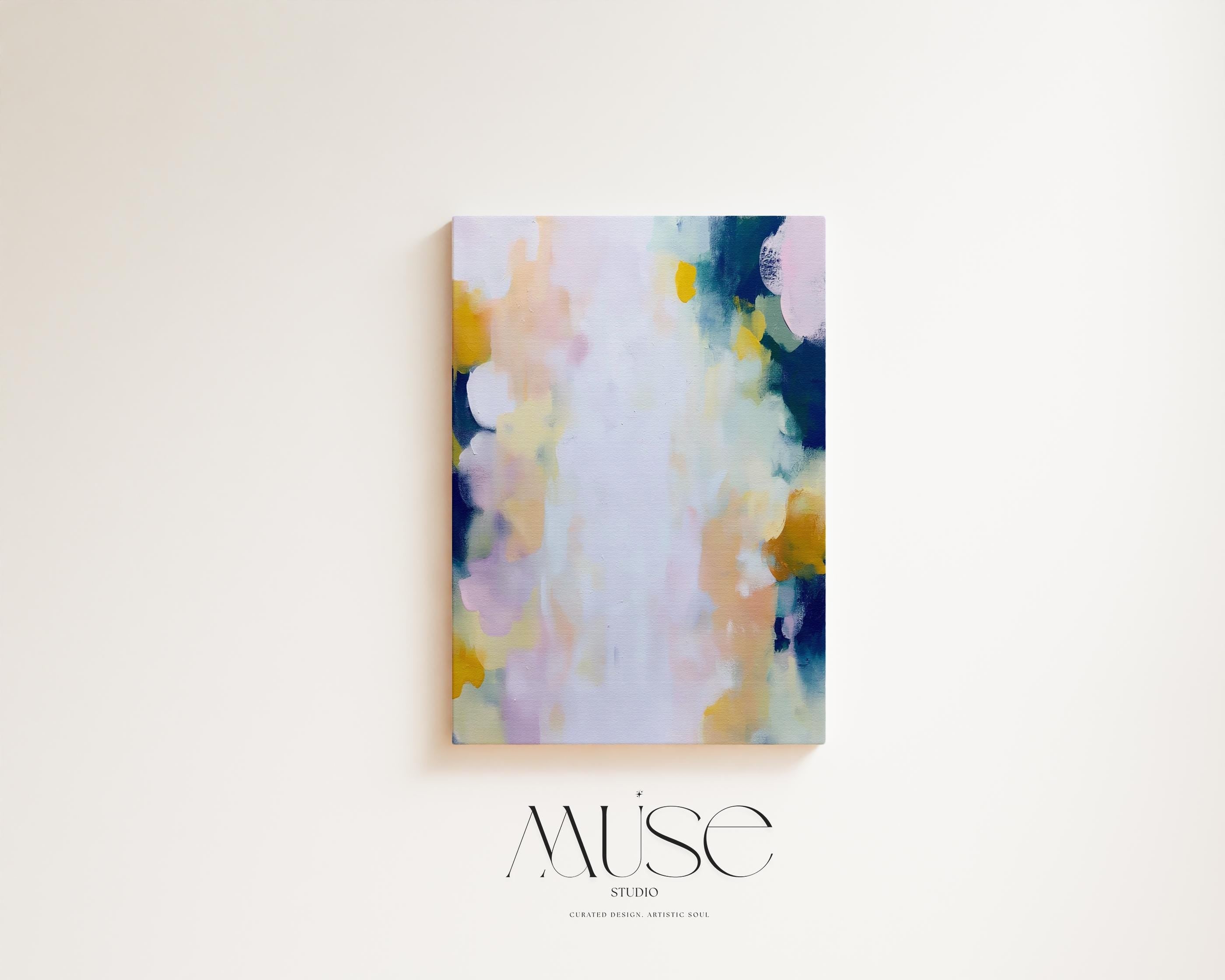 Muse Studio large vertical abstract canvas wall art printed with museum-grade giclée inks on premium gallery-wrapped canvas, featuring blush and navy pastel tones in an Organic Transitional style, styled above a dresser in a serene coastal bedroom.
