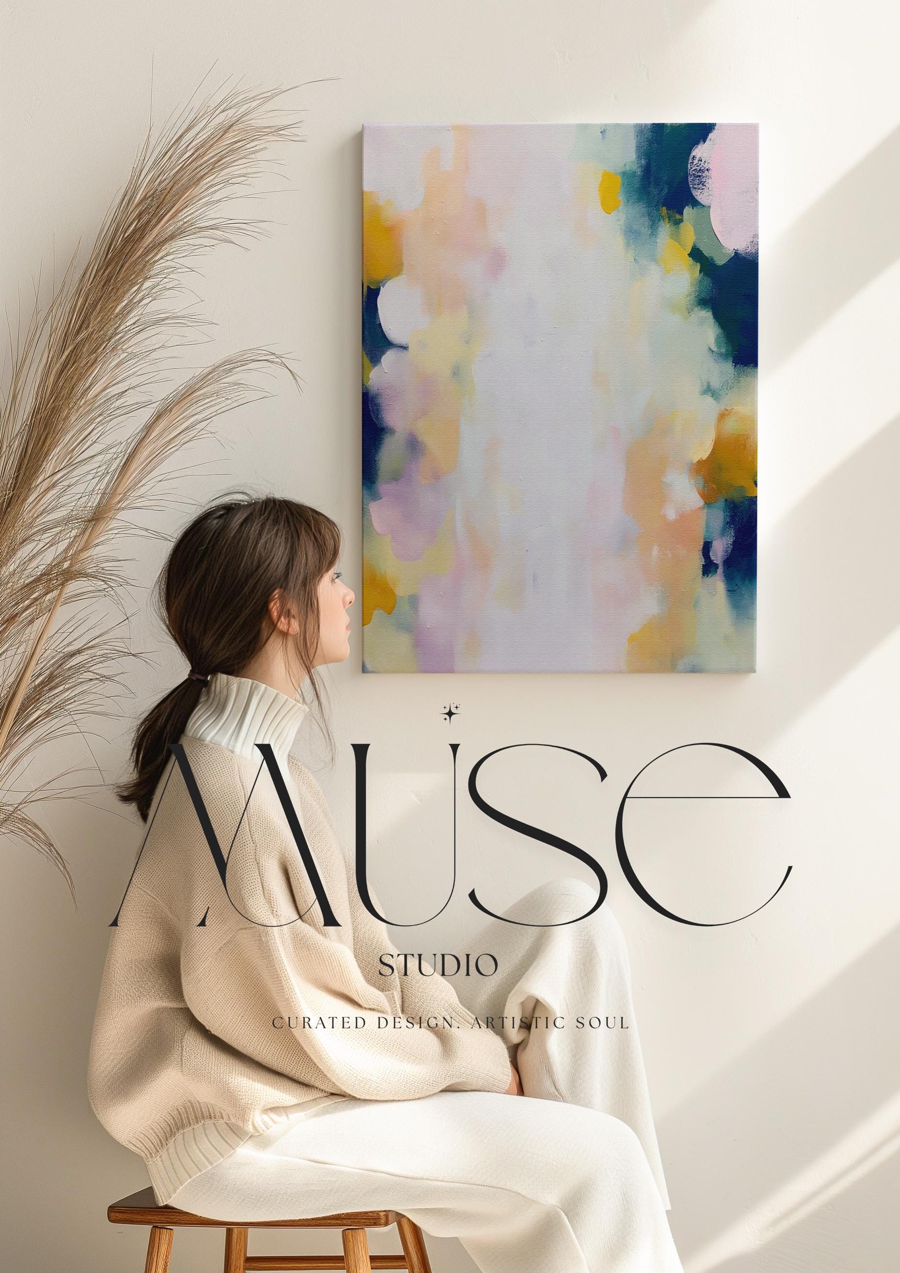 Muse Studio large vertical abstract canvas wall art printed with museum-grade giclée inks on premium gallery-wrapped canvas, featuring blush and navy pastel tones in an Organic Transitional style, styled above a dresser in a serene coastal bedroom.