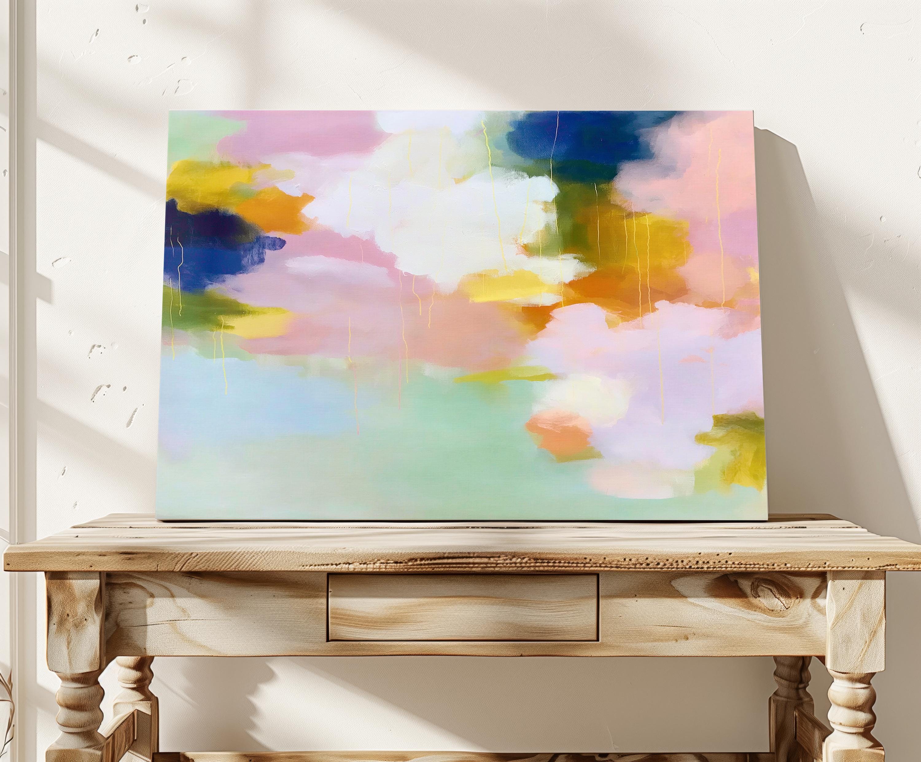 Muse Studio large horizontal abstract canvas wall art printed with museum-grade giclée inks on premium gallery-wrapped canvas, featuring blush, citrus, and navy pastel tones in a Soft Contemporary Pastel style, styled above a linen sofa in a coastal living room.