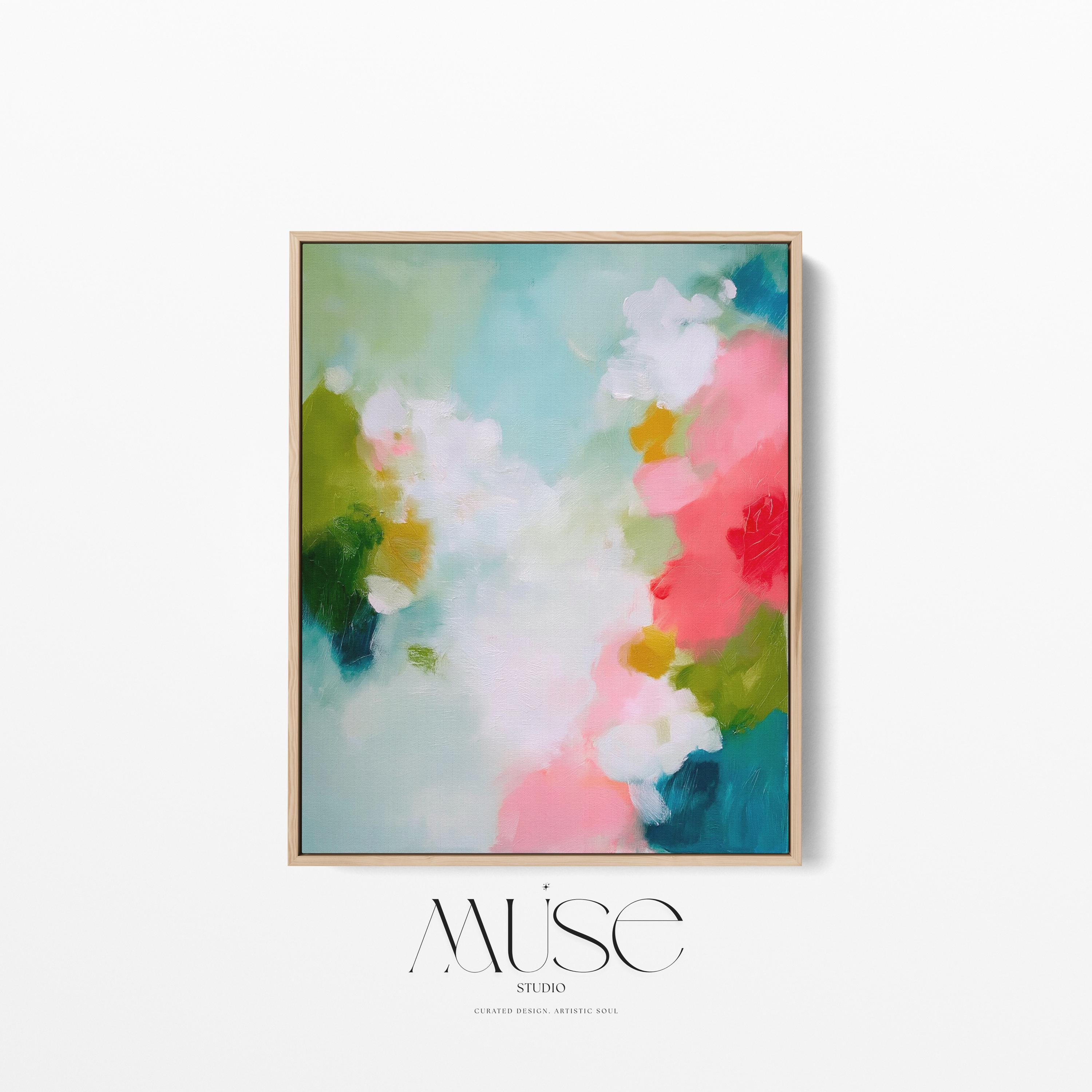Muse Studio large vertical framed abstract wall art printed with museum-grade giclée inks on premium gallery-wrapped canvas, featuring vibrant pink, aqua, and green floral tones in a Color Pop Eclectic style, styled above a bed in a preppy dorm room.