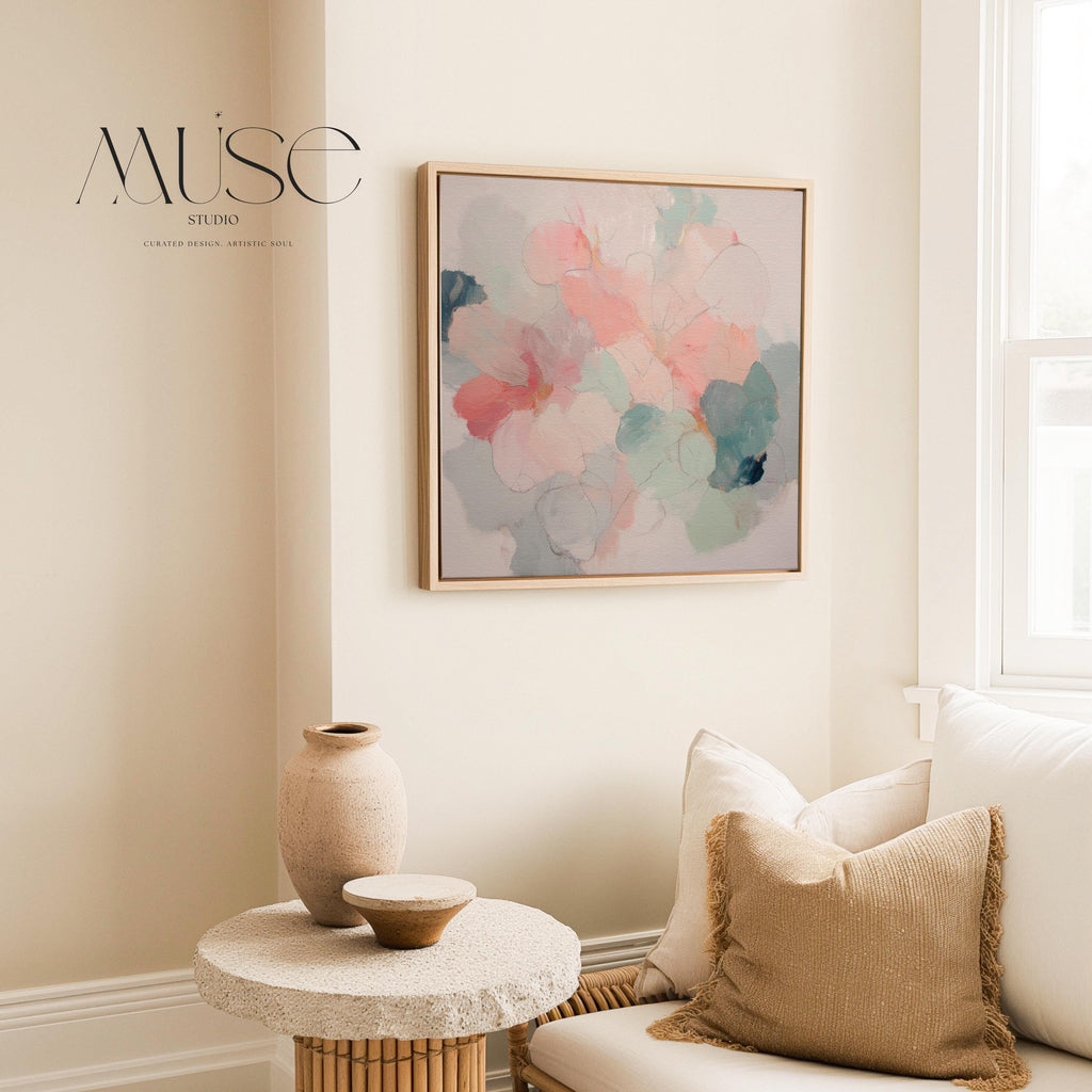 Muse Studio large framed floral abstract wall art created with soft blush and sage tones, produced on premium artist-grade canvas with museum-grade giclée inks and set in a solid wood float frame, styled for an Organic Transitional bedroom interior.