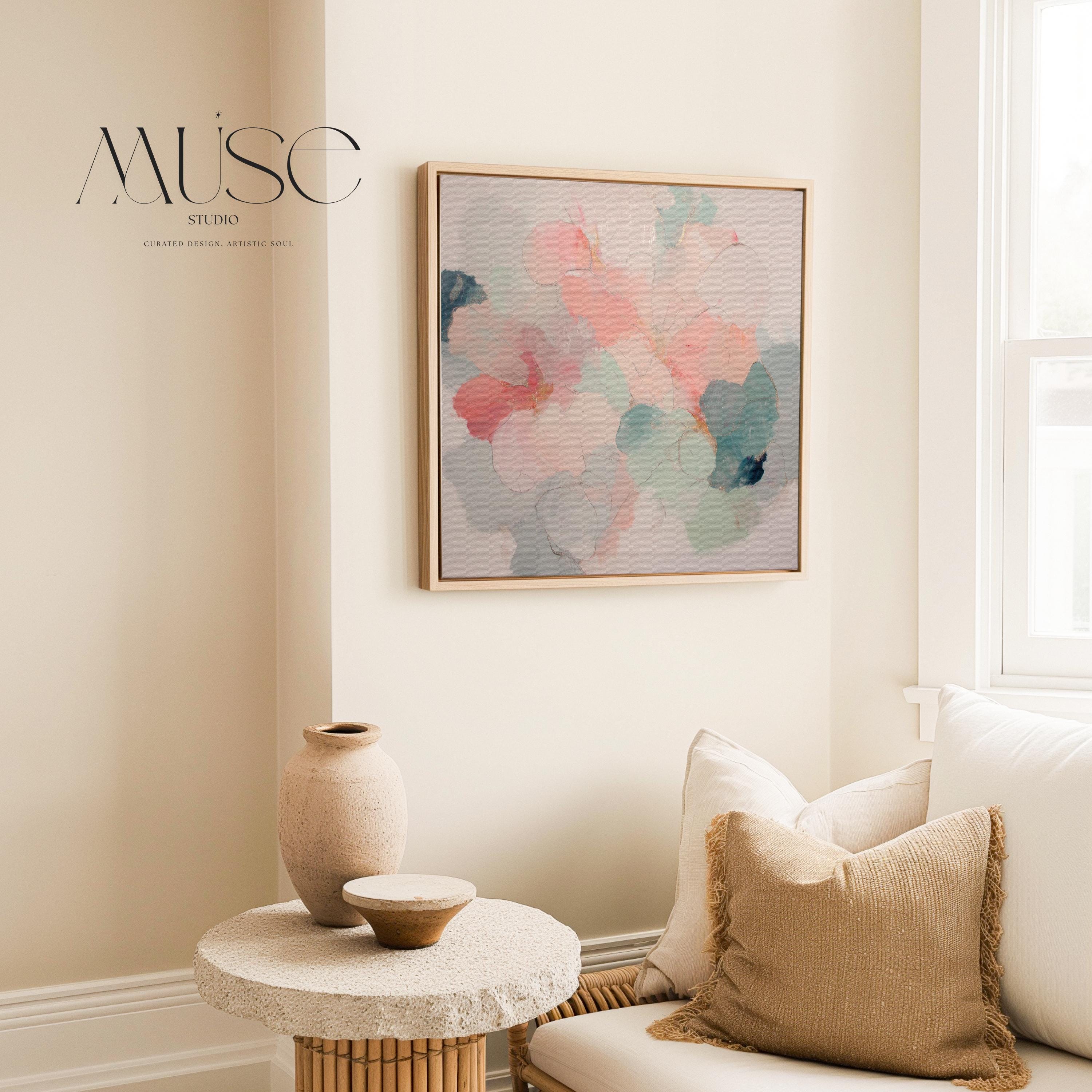 Muse Studio large framed floral abstract wall art created with soft blush and sage tones, produced on premium artist-grade canvas with museum-grade giclée inks and set in a solid wood float frame, styled for an Organic Transitional bedroom interior.