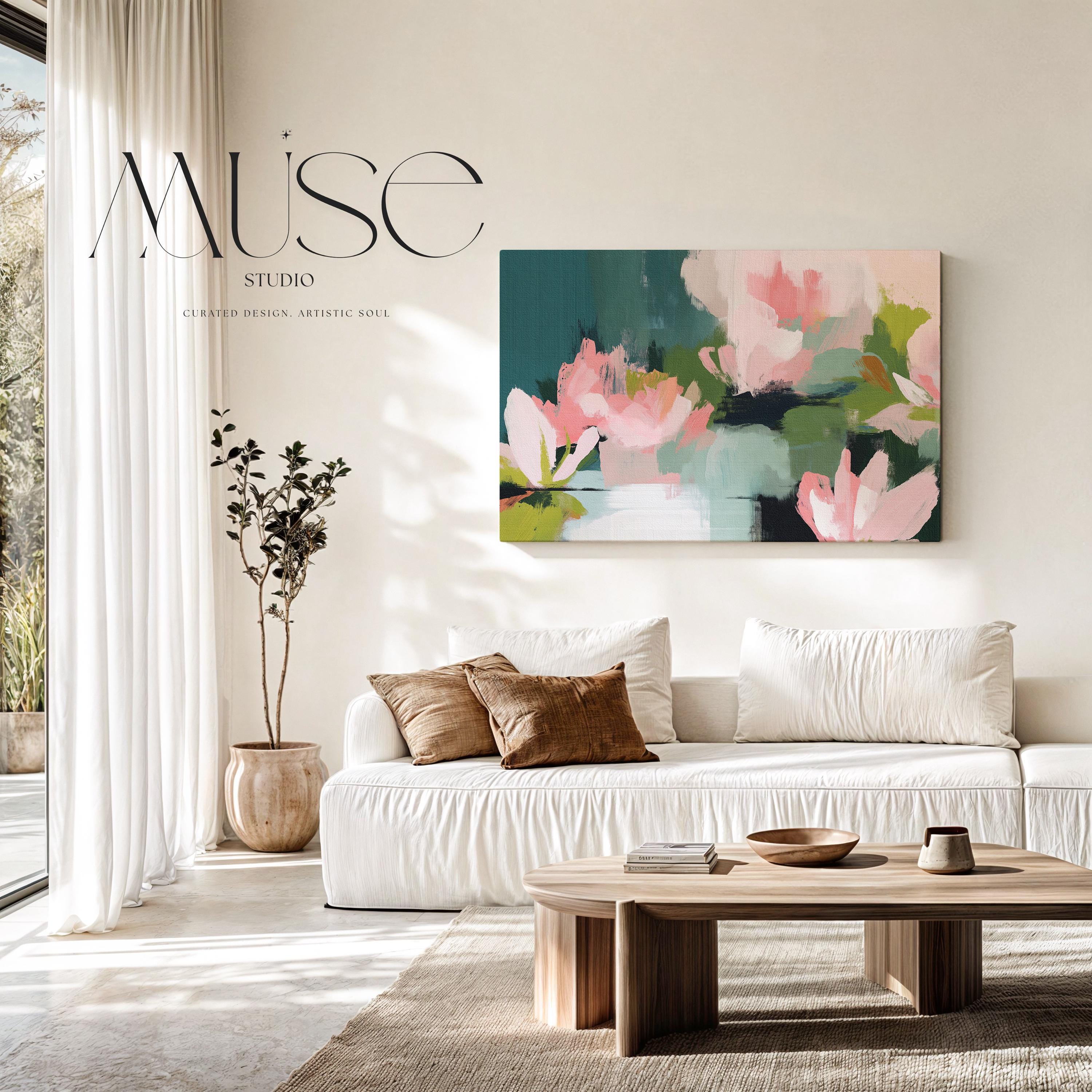 Muse Studio large horizontal floral abstract wall art in spring green, blush pink, and deep teal on museum-grade gallery-wrapped artist canvas, styled above a bed in a Romantic Botanical bedroom with Organic Transitional influence.