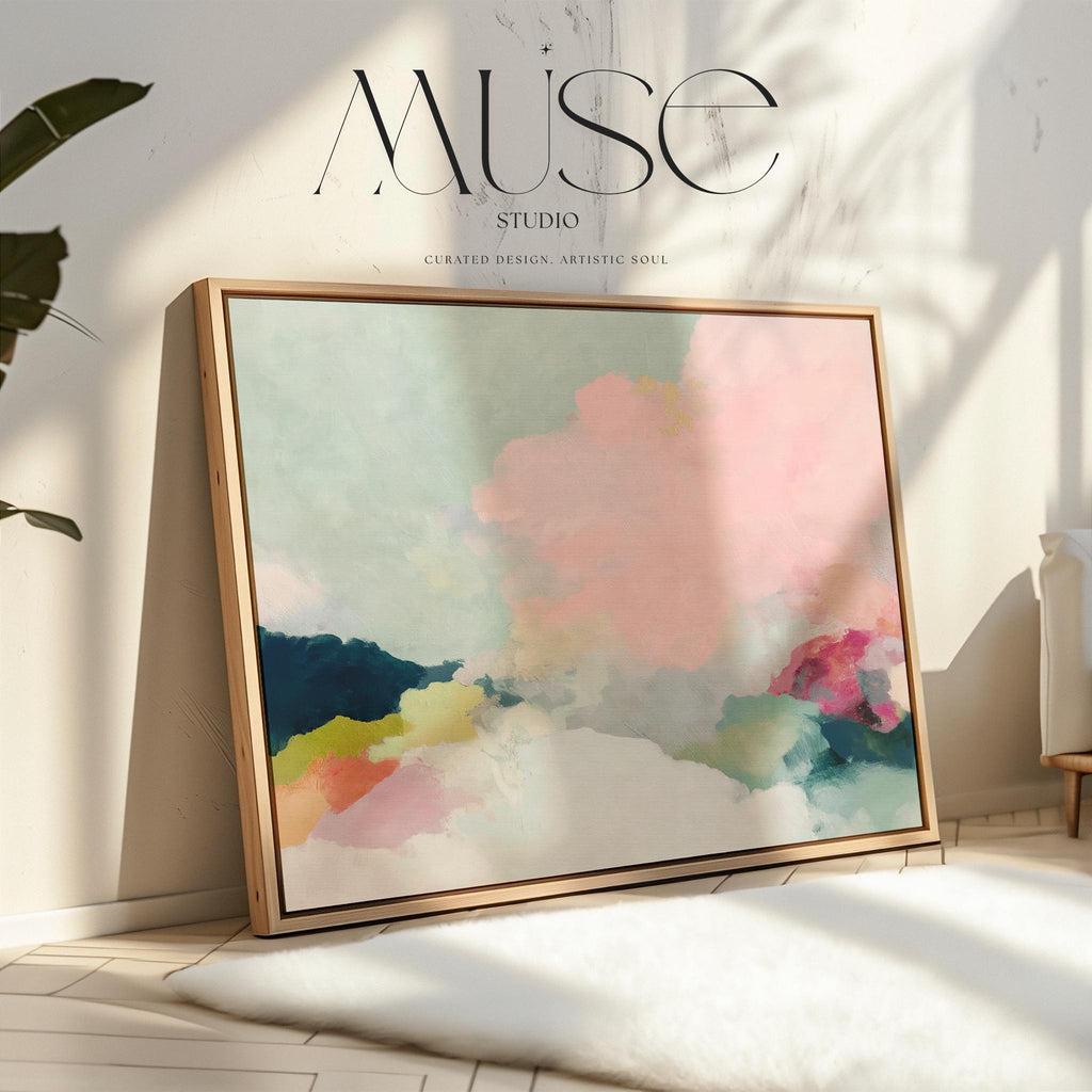 Spring Dawn No. 1059 by Muse Studio & Co. blush pink, mint green, navy, coral, and soft butter yellow abstract wall art printed with museum-grade giclée inks on premium gallery-wrapped artist canvas and custom framed in premium wood float frame options including natural, white, black, antique gold, and antique silver, styled above a neutral sofa in a calm designer living room.