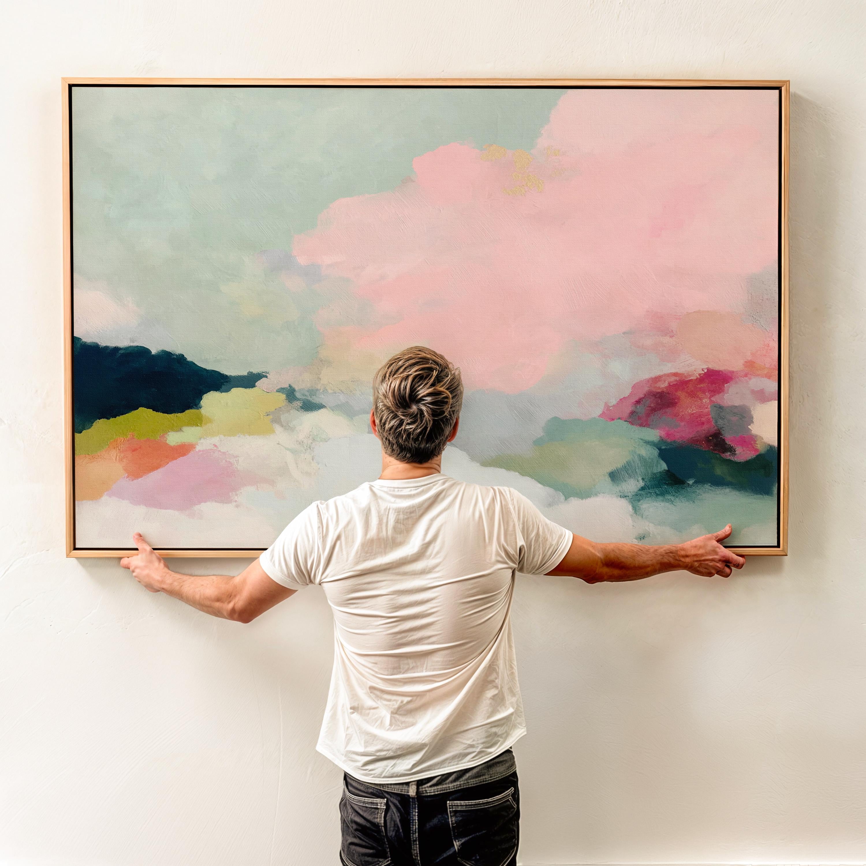 Spring Dawn No. 1059 by Muse Studio & Co. blush pink, mint green, navy, coral, and soft butter yellow abstract wall art printed with museum-grade giclée inks on premium gallery-wrapped artist canvas and custom framed in premium wood float frame options including natural, white, black, antique gold, and antique silver, styled above a neutral sofa in a calm designer living room.