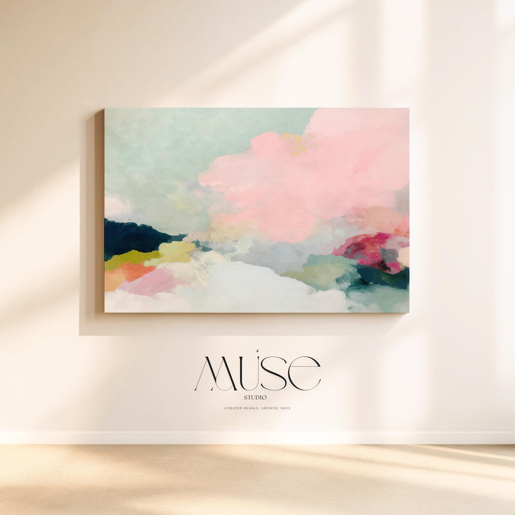 Spring Dawn No. 1059 by Muse Studio & Co. pink clouds abstract canvas wall art featuring blush pink, mint green, navy, coral, and soft butter yellow pastel colors printed with museum-grade giclée inks on premium gallery-wrapped artist canvas, styled above a neutral sofa in a calm designer living room interior.