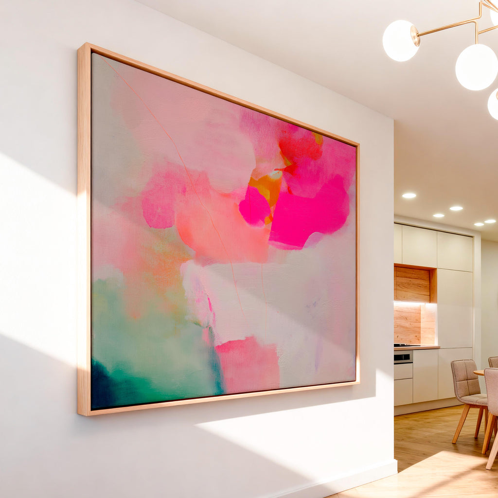 Bloom Aura No. 434 by Muse Studio & Co. pink coral, blush, mint green, and soft peach abstract wall art printed with museum-grade giclée inks on premium gallery-wrapped artist canvas and custom framed in premium wood float frame options including natural, white, black, antique gold, and antique silver, styled as oversized statement art in a modern designer living room.